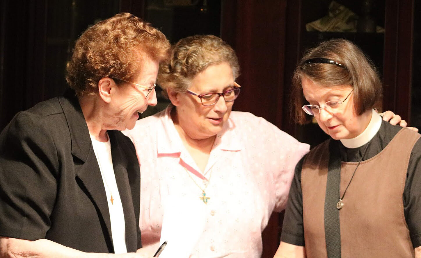  Sister Anita Kuchera (left) takes part in an interfaith prayer service at St. Francis Center for Renewal in Bethlehem, Pa., along with Sister Barbara DeStefano and Mother Laura Howell. 