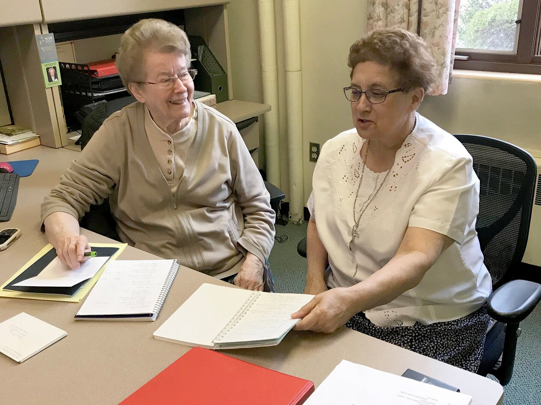  Sisters Anita Kuchera (left) and Barbara DeStefano plan retreat programming at St. Francis Center for Renewal in Bethlehem, Pa. 
