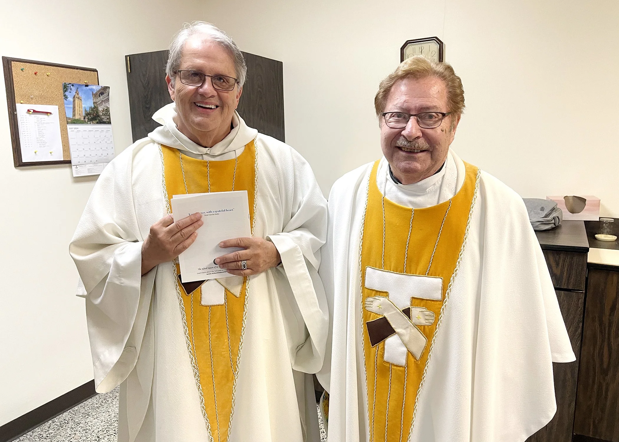 Rev. John Bachkay and Rev. Donald Buchleitner prepare to celebrate Sister Cecilia Jacko's 75th Jubilee Mass on July 14, 2023, at Mt. Assisi Place. 