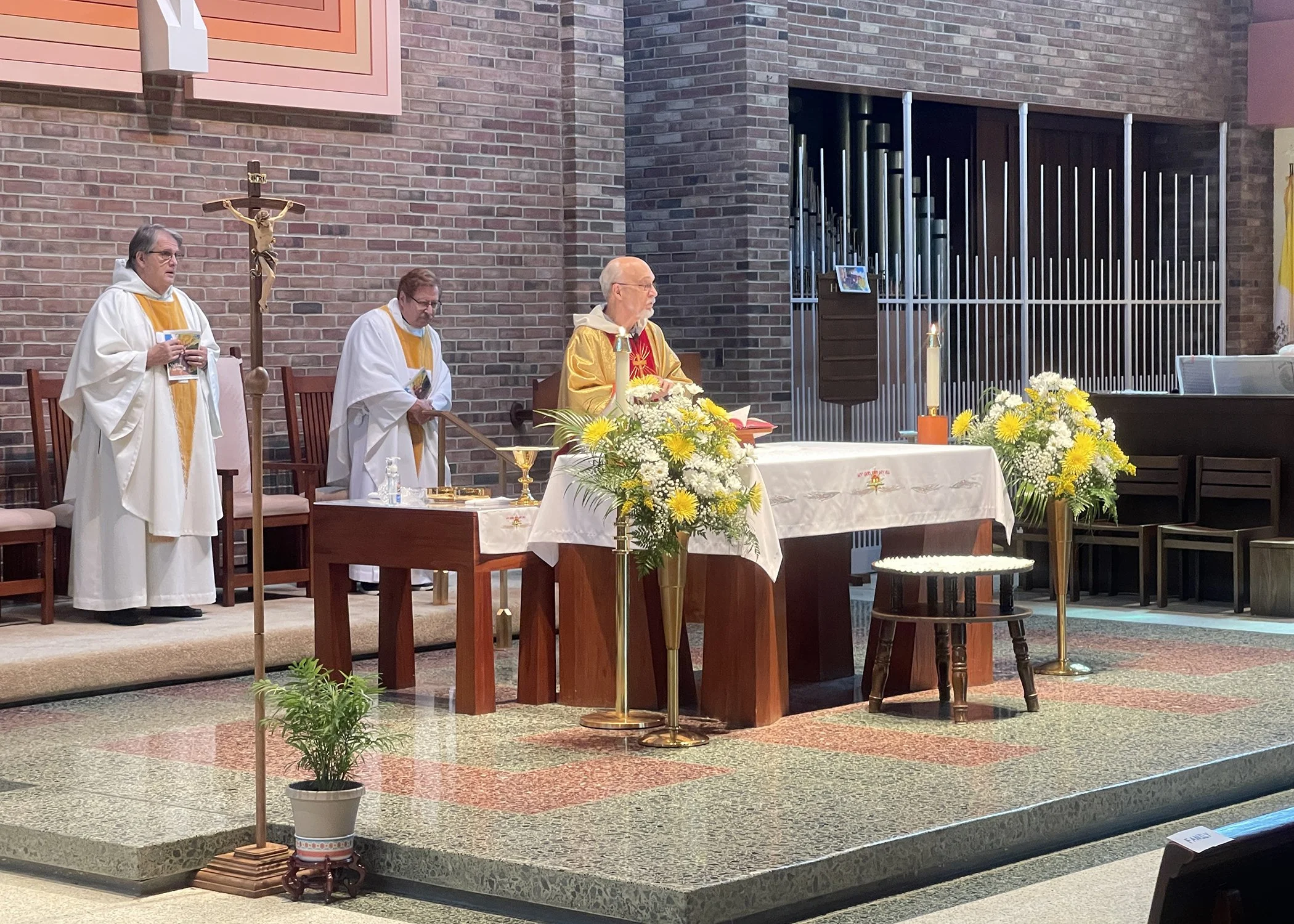  Father Richard Zelik officiates Sister Cecilia Jacko's 75th Jubilee Mass at Mt. Assisi Place on July 13, 2024. 