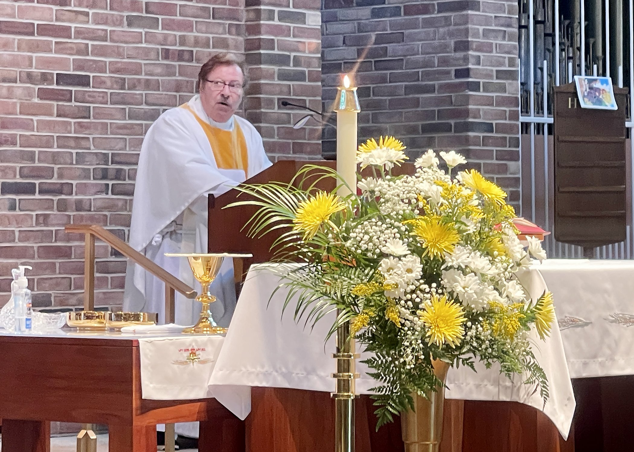  Father Donald Buchleitner delivers the homily during Sister Cecilia Jacko's 75th Jubilee Mass on July 13, 2024. 