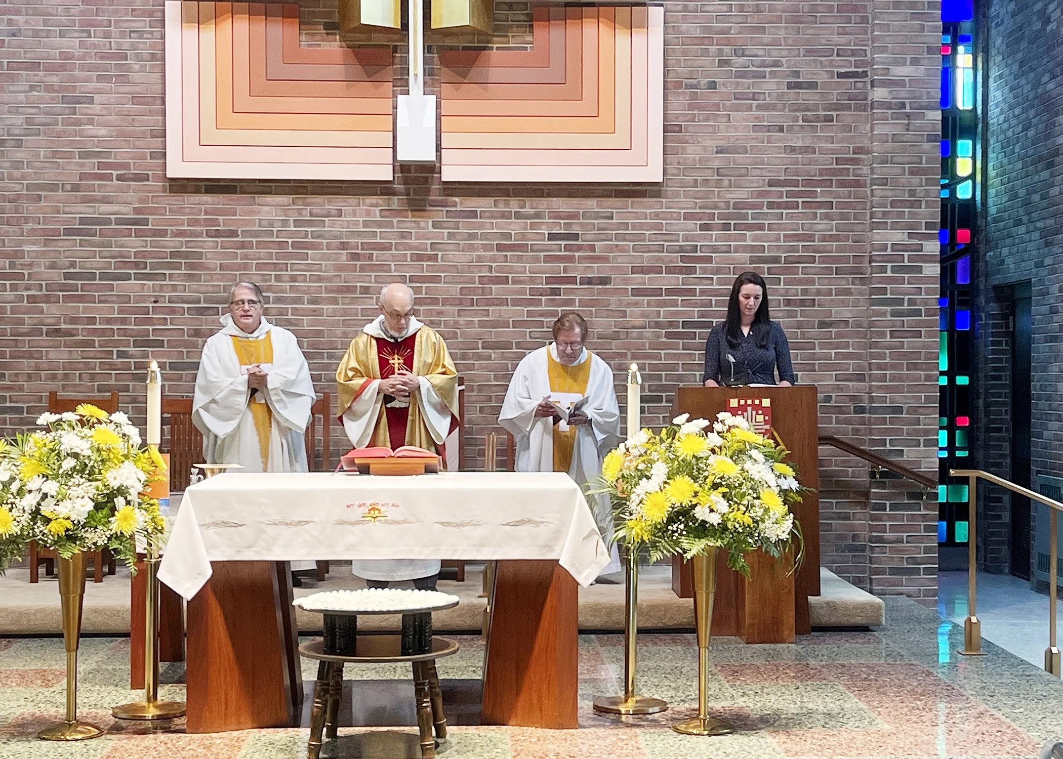  Stephanie Francis, great niece of Sister Cecilia Jacko, reads the Prayers of the Faithful during Sister's 75th Jubilee Mass on July 13, 2024. 