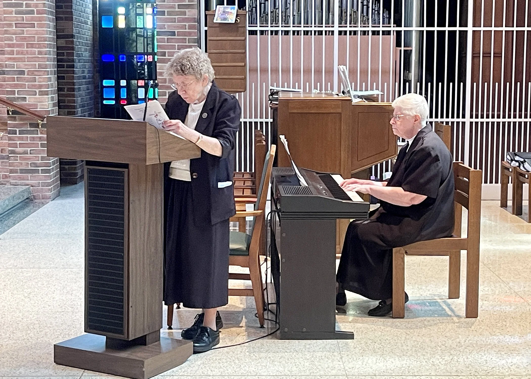  Sisters Patricia Ann Mahoney (left) and Lorita Kristufek serve as cantor and music minister for Sister Cecilia Jacko's 75th Jubilee Mass on July 13, 2024. 