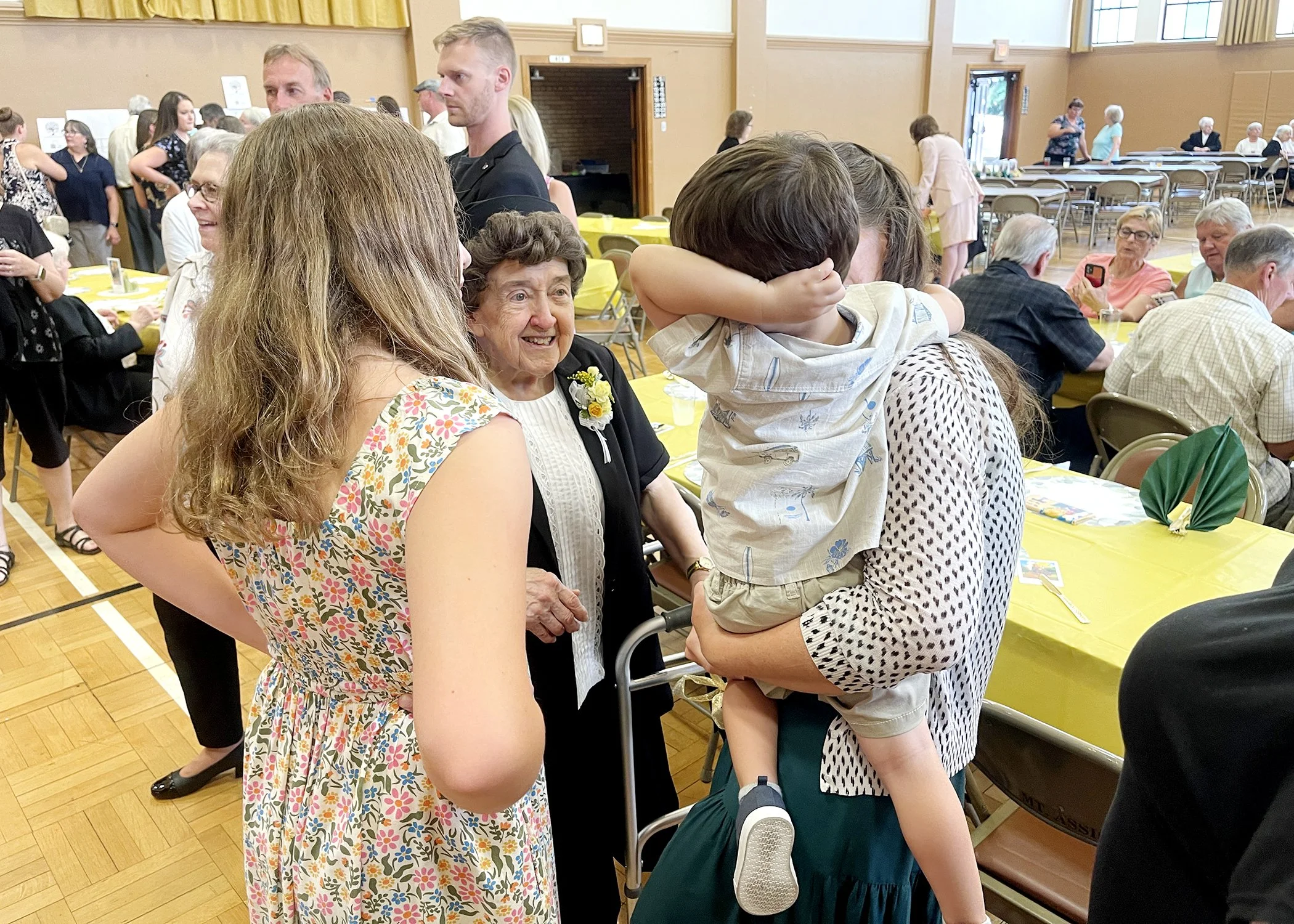  Sister Cecilia Jacko visits with family members during her 75th Jubilee celebration on July 13, 2024. 