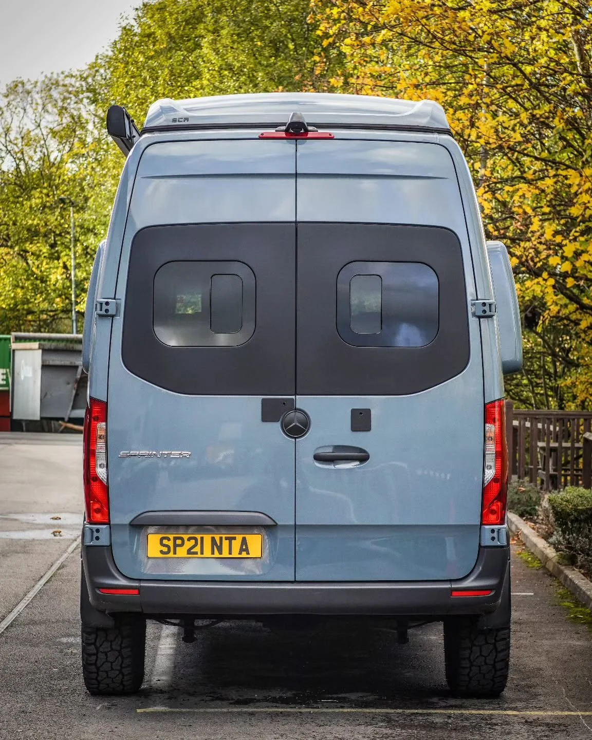 Wrap um paint um leave um..
The 907 GRP rear door window panels come in a mirror black gloss gelcoat which you can fit and forget. If you want a different look then a wrap is a good option as is a paint job. Pictured here in 3M matt black vinyl.
Pane