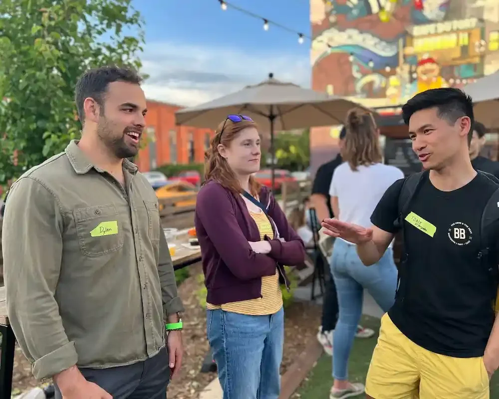 3 business owners networking outside