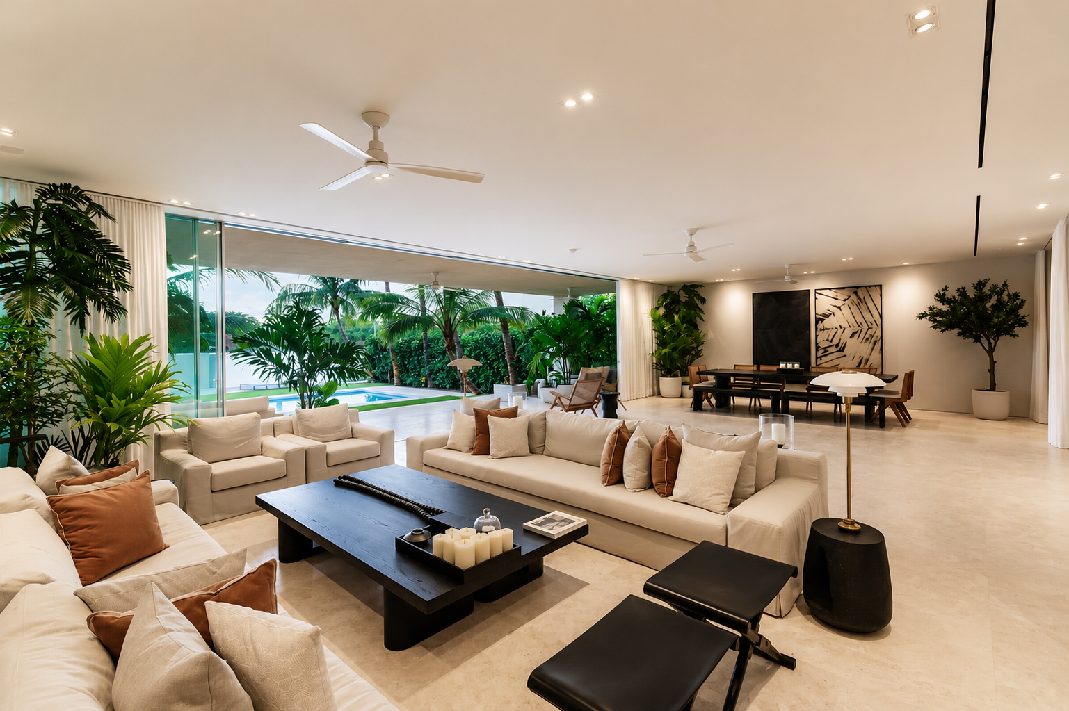 a living room with elegant but simple contemporary furniture and a few found antiques like the Poulson lamps and mohair pillows.