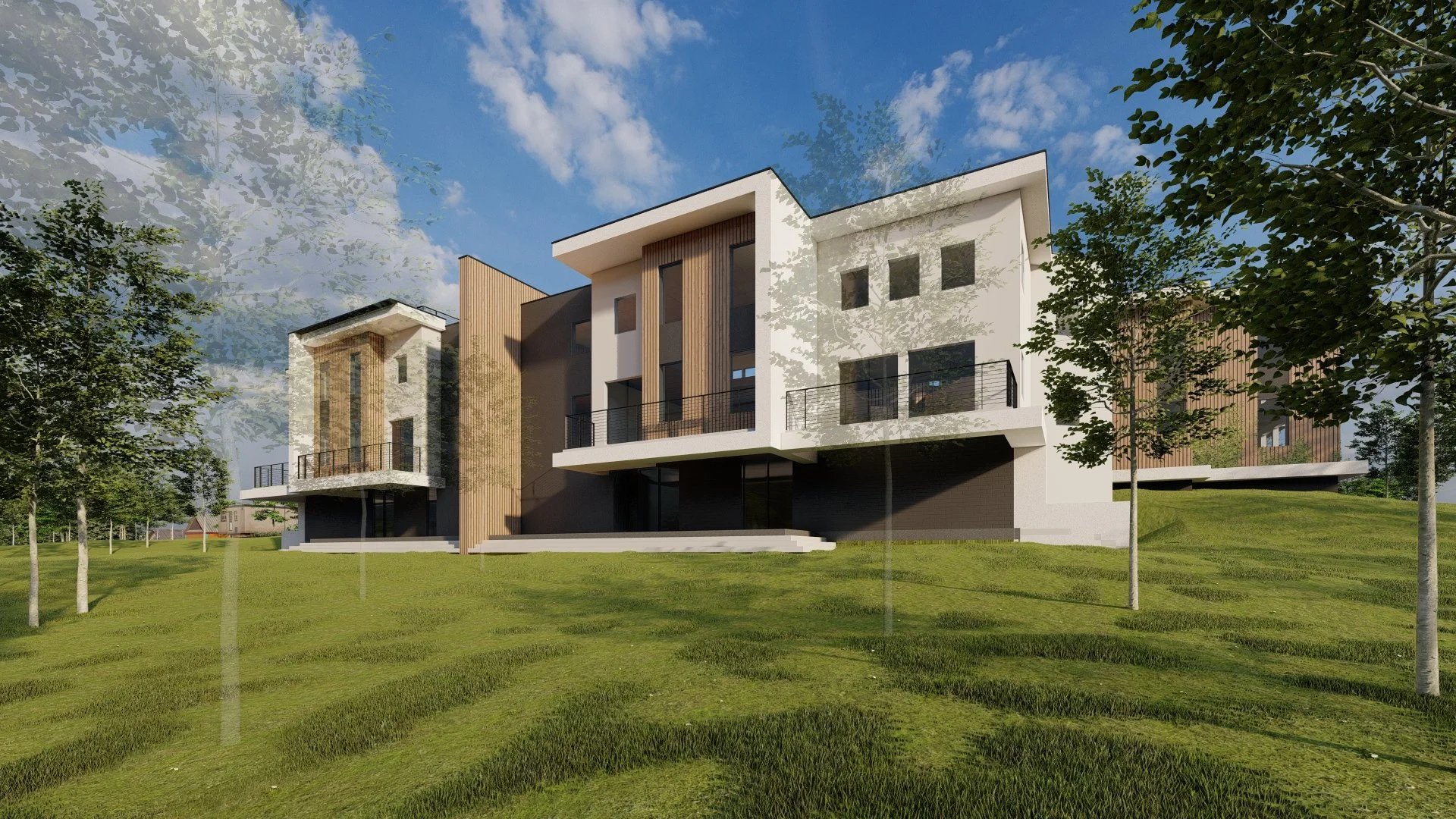 Modern multi-story residential buildings on a green hillside with trees and a partly cloudy sky.
