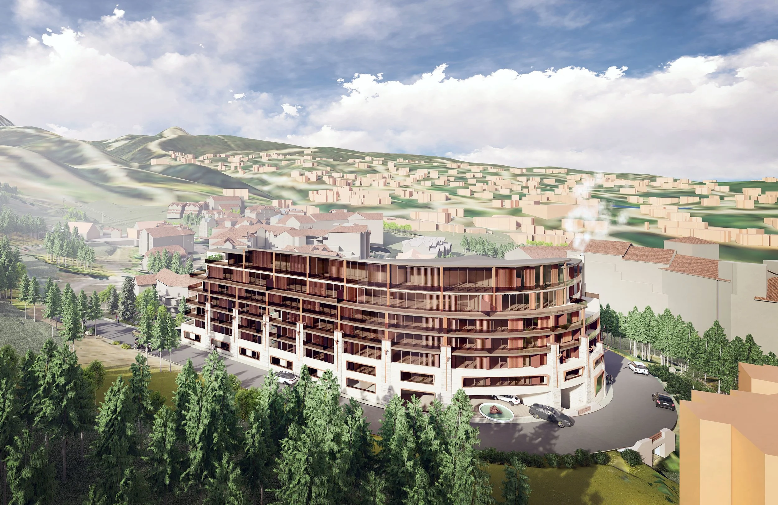 the sweeping curved architecture of the six senses traces the lot line and mountain village boulevard. the village can be seen in the background rising up the mountain..