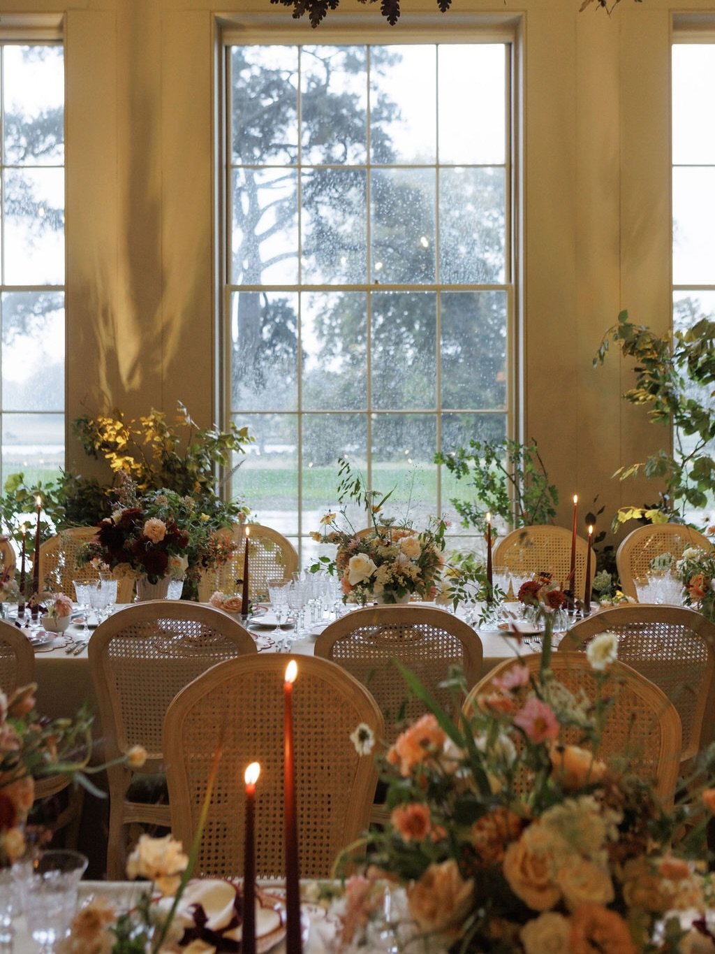 Warm, candlelit tablescapes over flowing with abundant florals, rich winter textures and layered tableware. We combined rosehips with grasses for seasonal texture, adding in ruffled florals and dainty details to create our signature timeless aestheti