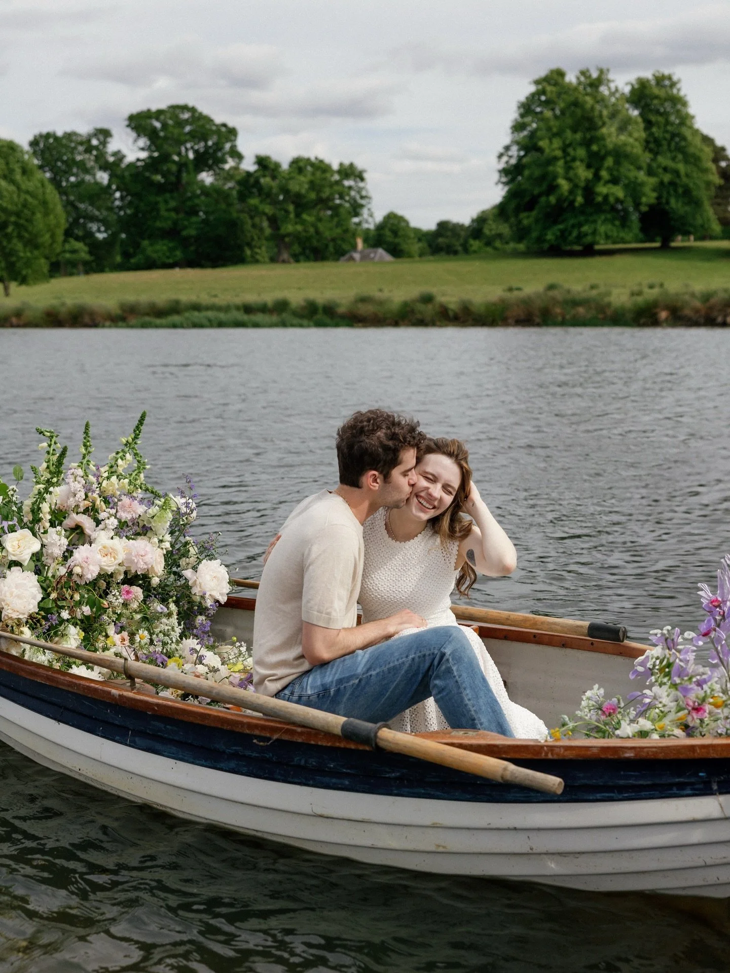 I love repurposing flowers and I don&rsquo;t think it can get more fun than laying them all in a boat and rowing across a lake 🌸 Photography &amp; Super 8: @emmawilderphoto 
Planner @attabara 
Venue @wildernessreserve 
Dress @katherinetash 
Florals 