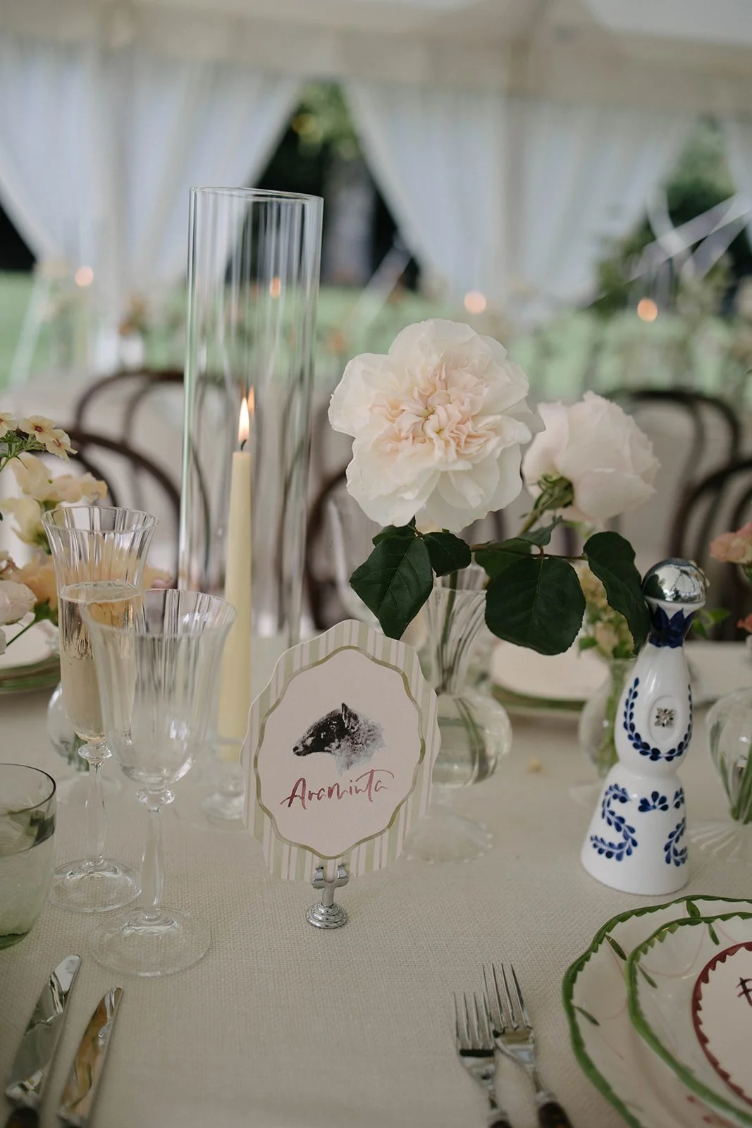Elegant Cornwell Manor wedding table with white flowers candles and glassware styled with bespoke luxury floristry by The Botany House