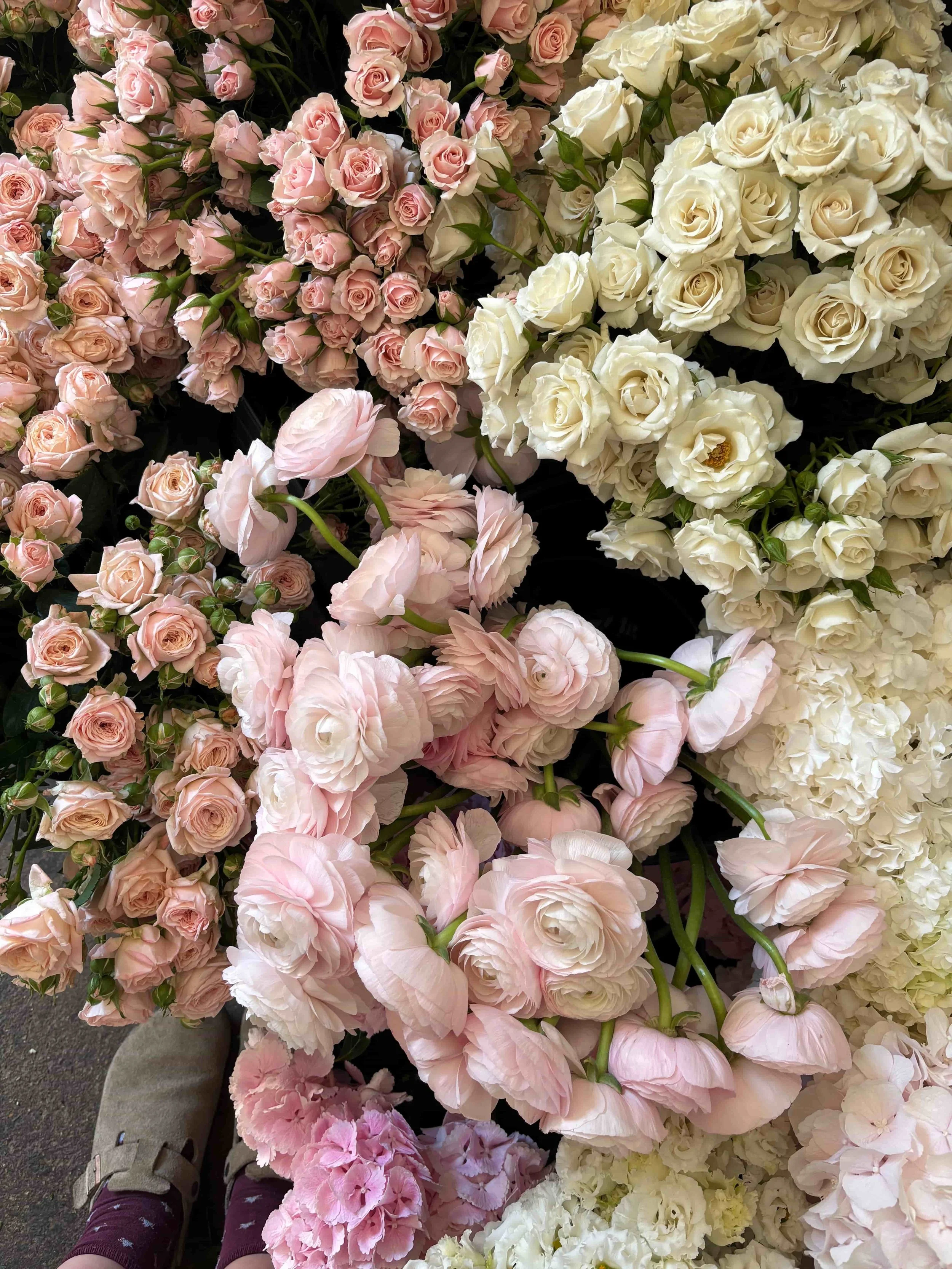 Arrangement of various white and pink roses and flowers. The Botany House studio in Norfolk. In preparation for Mother's Day bouquet gifting, the best in Norfolk