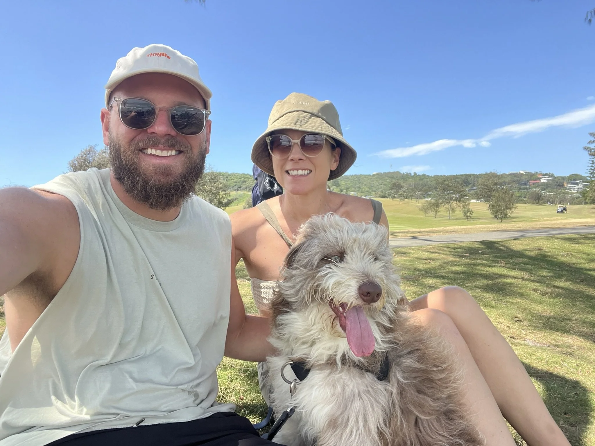 Lachlan McDonald and his wife Rebecca with their dog Val outdoors in Sydney