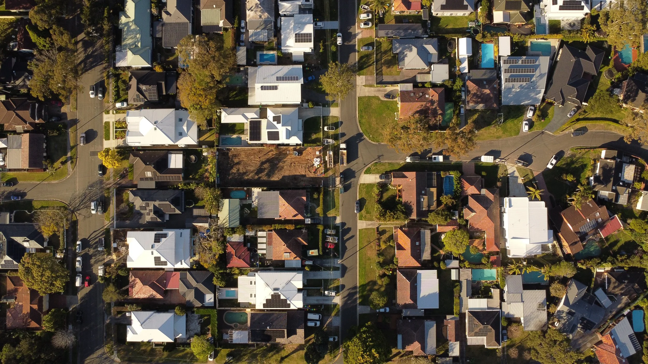 Aerial view of Kirrawee Sydney residential site before duplex construction by Caton Constructions