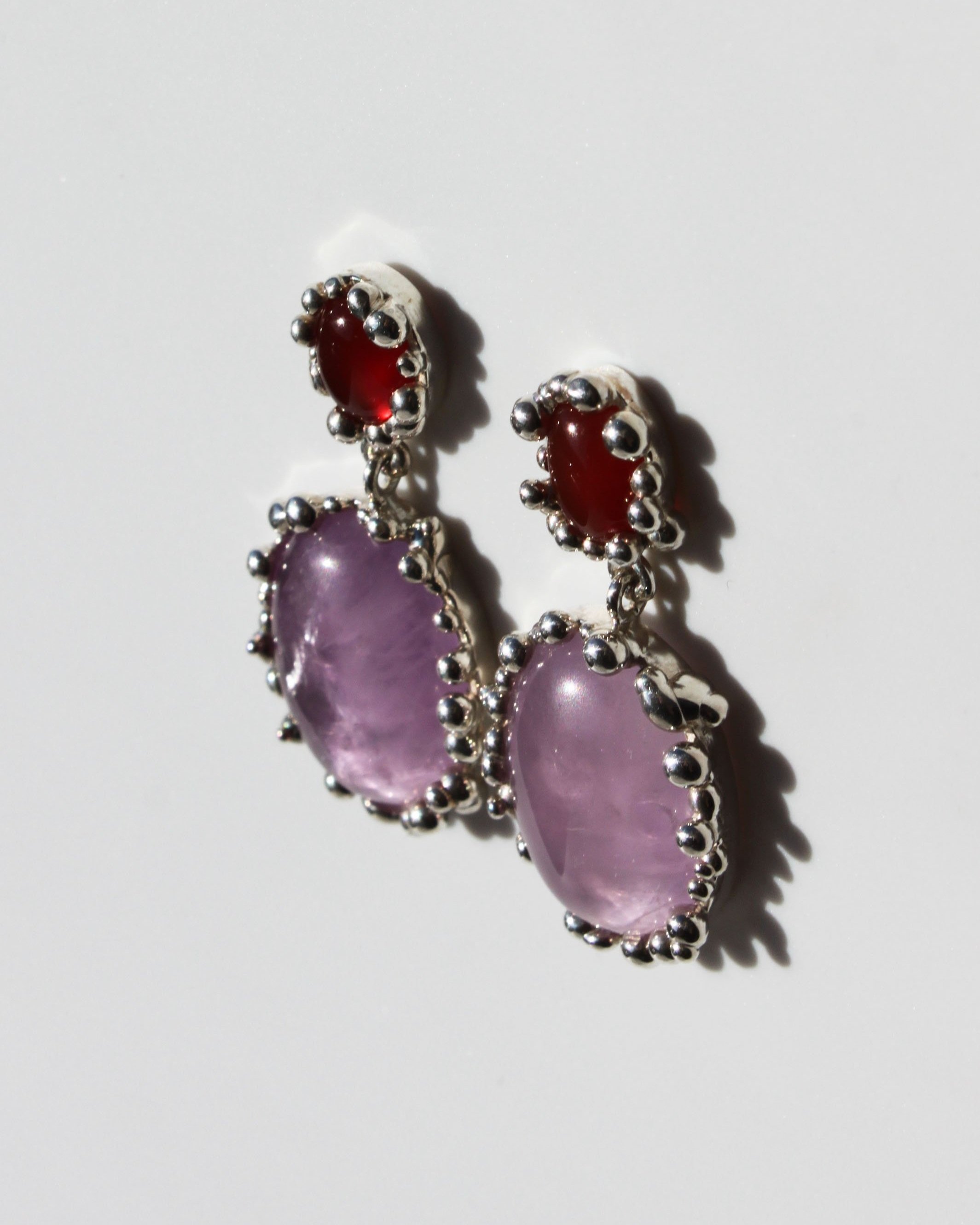 Carnelian+%26+Amerthyst+Two+Stone+Earrings+from+the+side+-+portrait+-+HoH+-+.jpg