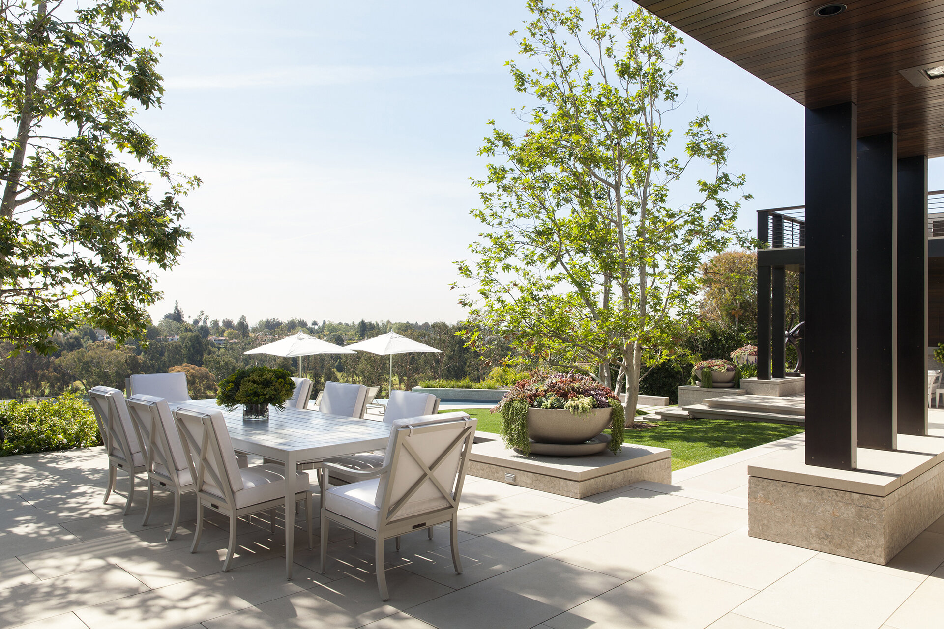  Luxury contemporary modern highest quality builder and general contractor custom home in the Pacific Palisades neighborhood of Los Angeles featuring architectural residence with beautiful landscaped back yard and patio published in Luxe Magazine.  
