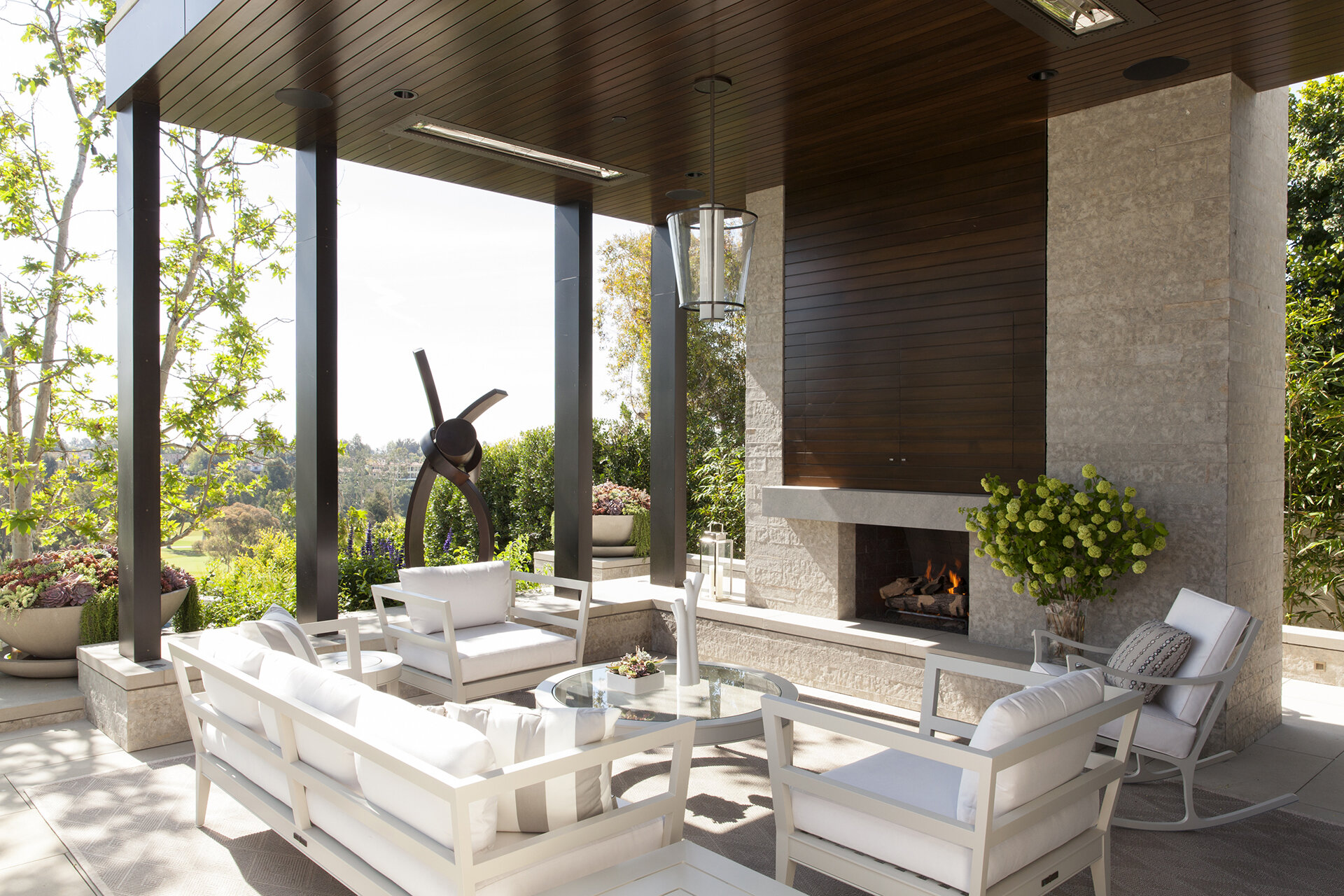  Luxury contemporary modern highest quality builder and general contractor custom home in the Pacific Palisades neighborhood of Los Angeles featuring architectural residence with beautiful landscaped patio and outdoor living room published in Luxe Ma