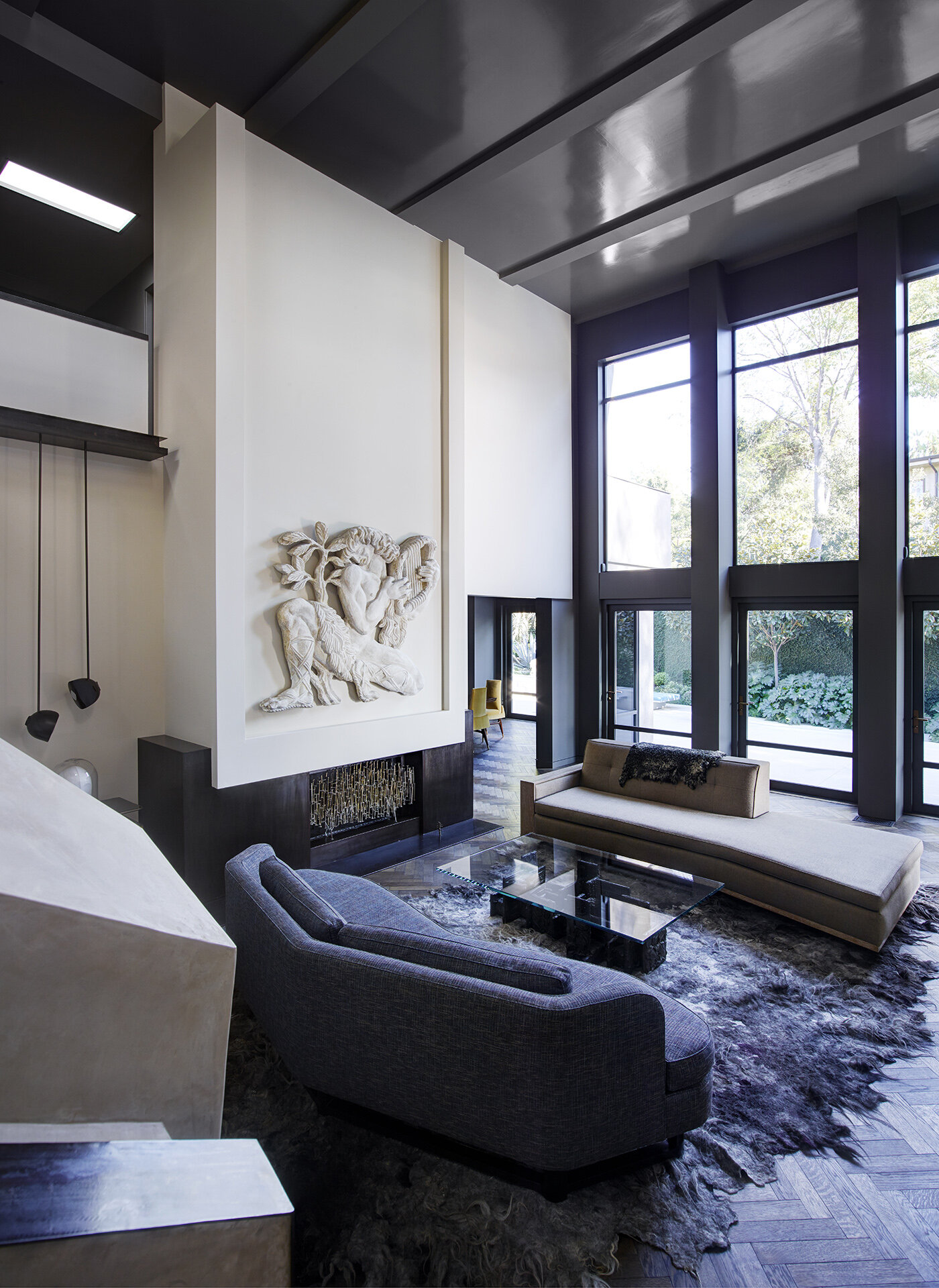  Luxury general contractor award winning architectural modern home for celebrity photographer in the Hollywood Hills neighborhood of Los Angeles Italian detail art collector living room featured on the cover of Elle Decor.  