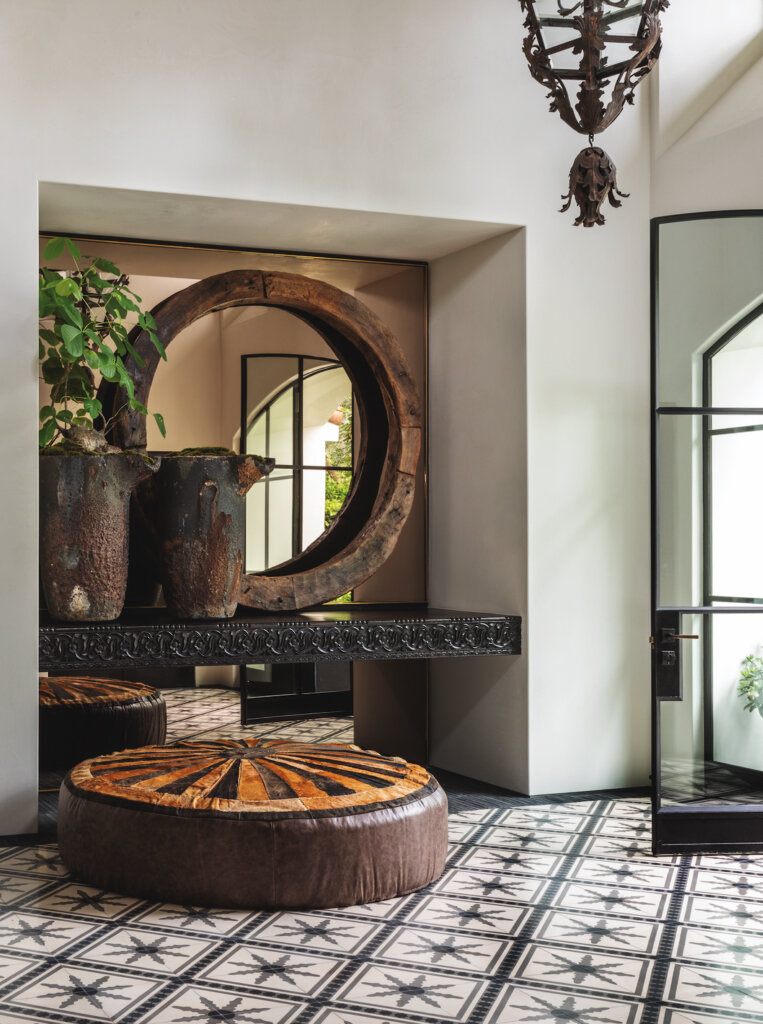  Custom luxury estate general contracting company Spanish Colonial California residence in the Beverly Hills neighborhood of Los Angeles featuring encaustic floor tile, Moorish Moroccan details, steel framed doors, and arched ceilings.  