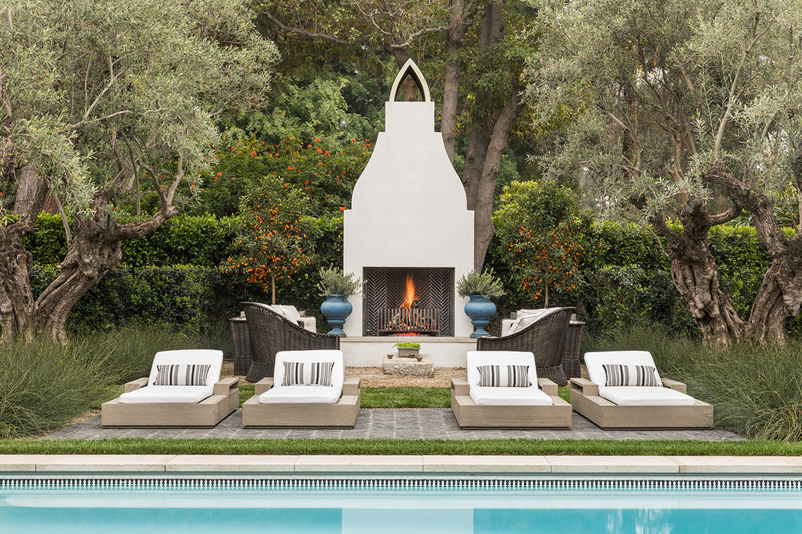  Custom luxury estate general contracting company Spanish Colonial California residence in the Beverly Hills neighborhood of Los Angeles featuring Moorish Moroccan style outdoor fireplace with class pool design and chevron herringbone slate floor til
