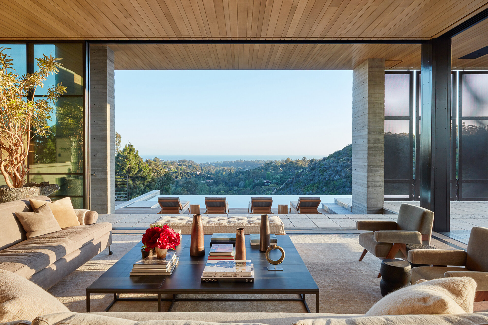  Custom luxury home general contractor built modern private residence in the Pacific Palisades neighborhood of Los Angeles featuring wood ceilings, indoor outdoor living with retractable operable metal screen walls.  