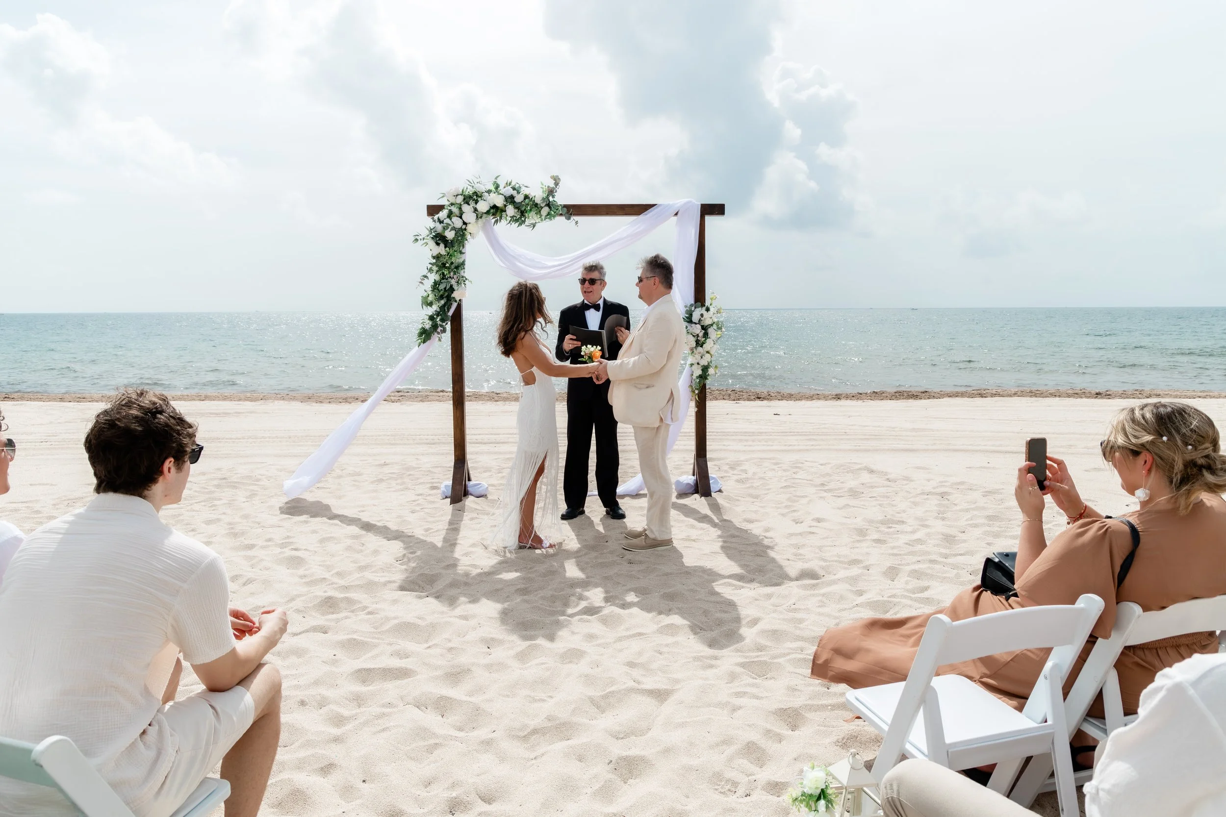 2 marriers in front of wedding officiant in Fort Lauderdale