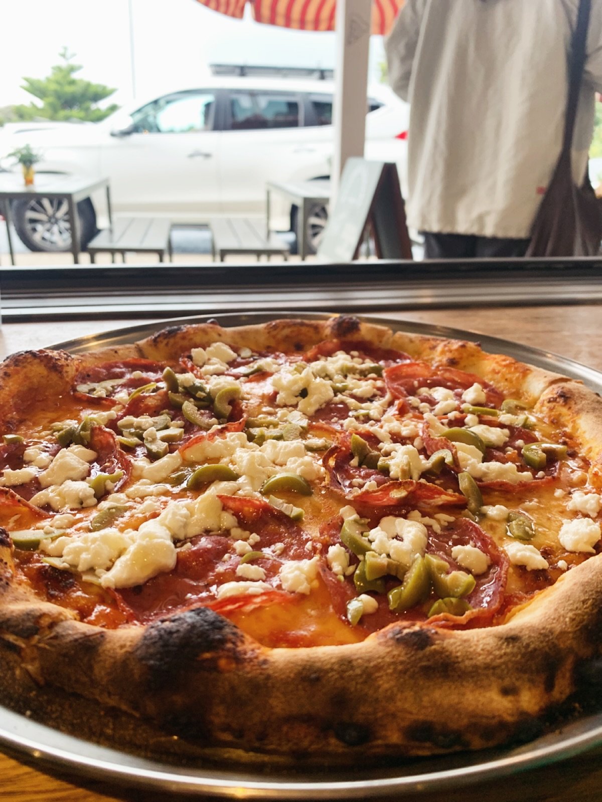 The Stallion- tomato base, mozzarella, pepperoni, green olives &amp; goats cheese, topped with hot &amp; spicy honey.