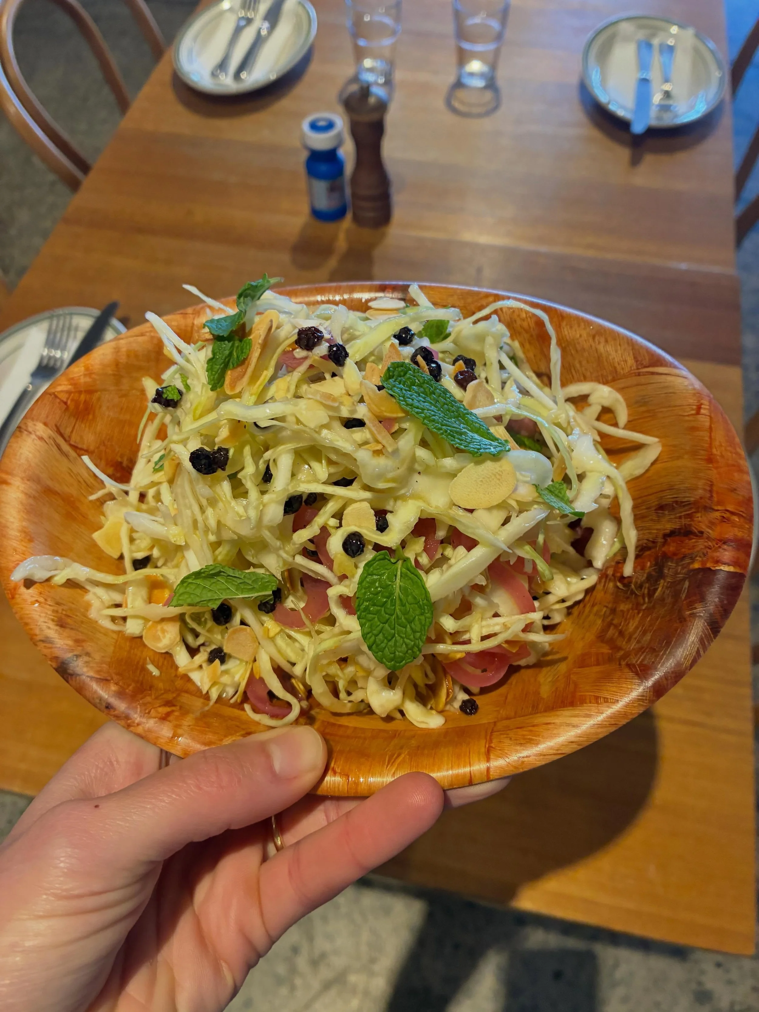 Perfect crisp edition to your meal.
Cabbage, mint, pickled onion, currants &amp; almond salad.