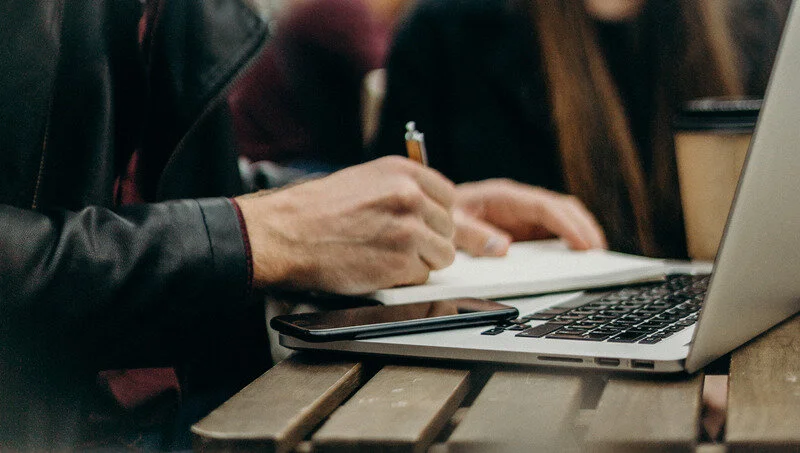 Canva - Person Taking Notes At Work.jpg