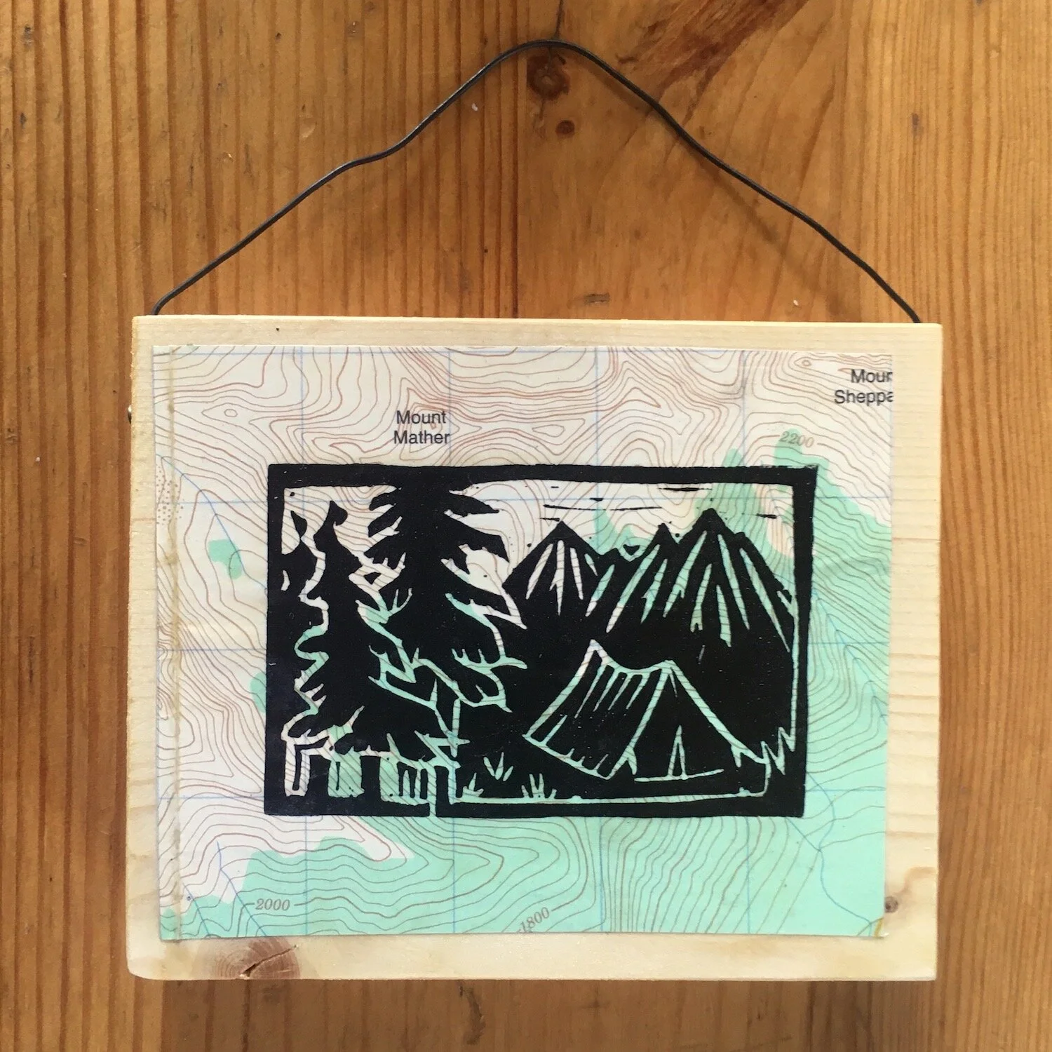 Mini wall art camping and mountain landscape block print on recycled materials and top map by Aaron Enns Artist and A.C.M.G. Ski guide