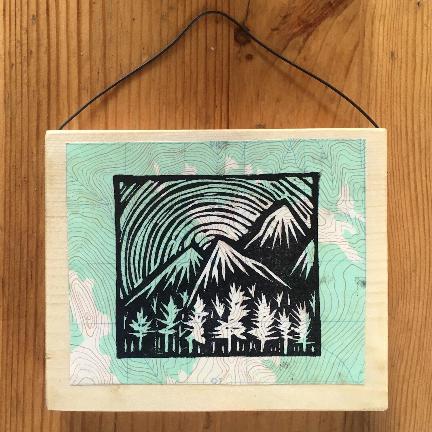 Mini wall art block print on recycled map paper by Aaron Enns A.C.M.G. Ski Guide works backcountry off piste guiding in Golden B.C. Canada