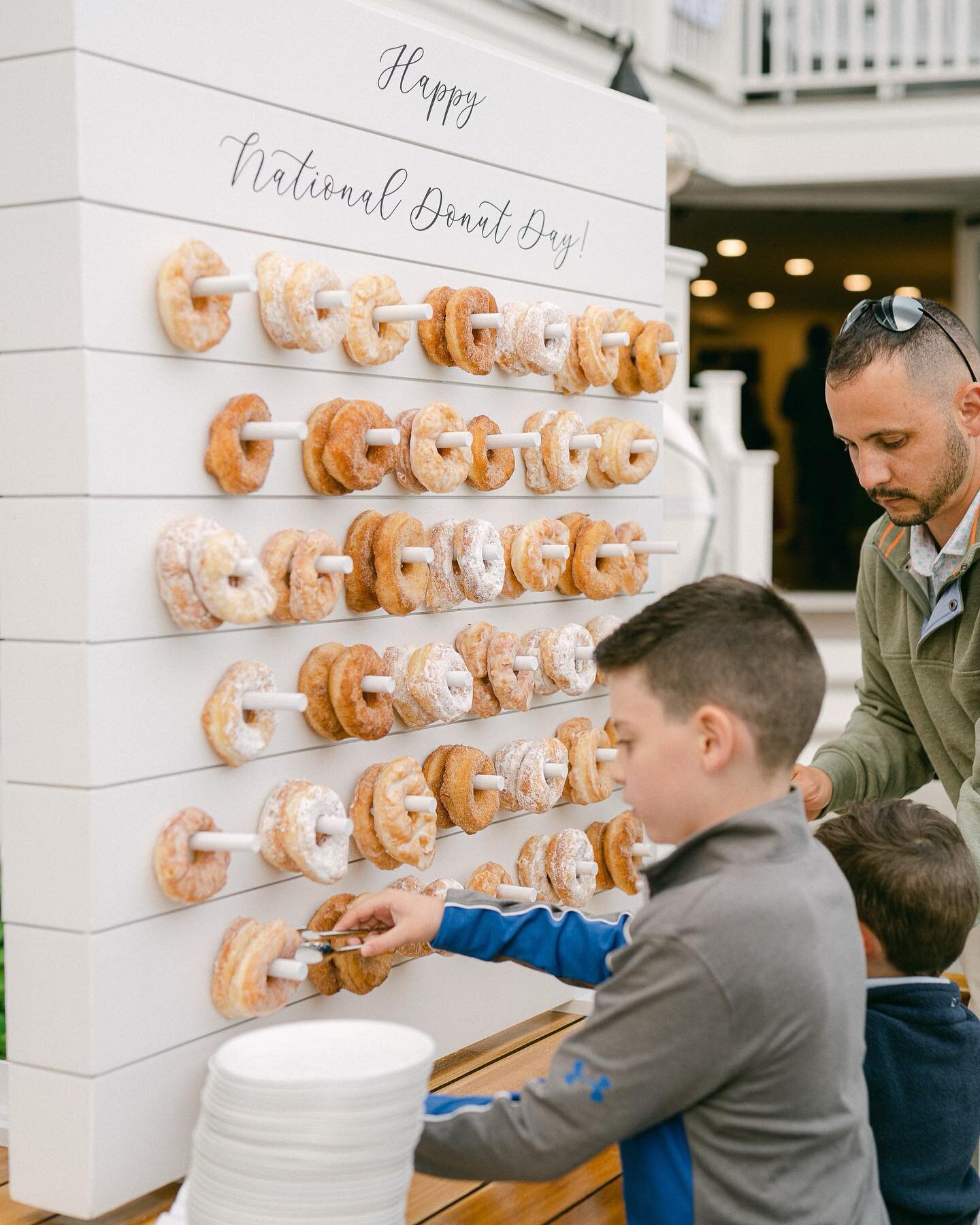 Did you know there&rsquo;s a National Donut Day? Our couple capitalized on the occasion and used our &ldquo;Tommy&rdquo; backdrop as a welcome for their wedding guests. We love the layered donut look!

Photo // @abbietylerphoto