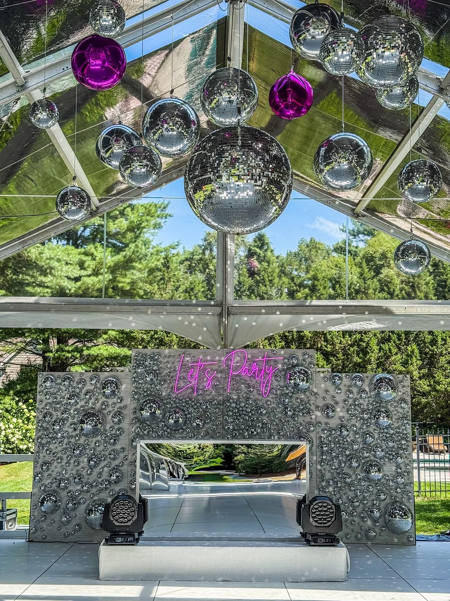 Some backdrops sparkle&hellip; and then there&rsquo;s THIS one. For a 50th birthday bash that was all about big energy and bigger celebrations, we built a wall completely covered in disco balls with a glowing let&rsquo;s party sign. Because if you&rs