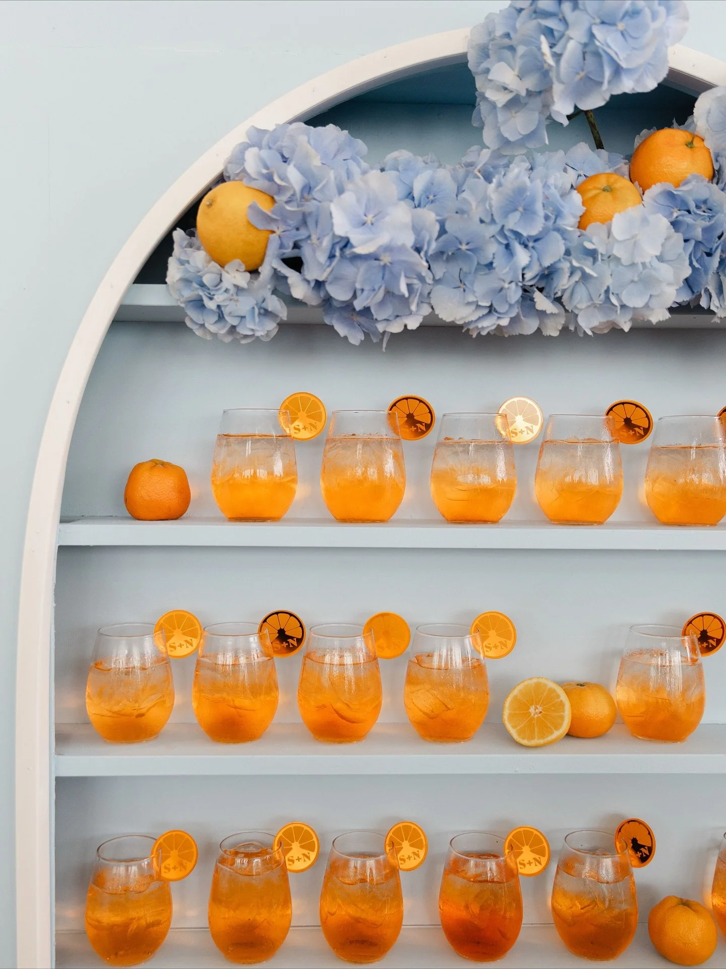 Orange you glad we brought the Aperol Spritz backdrop?! 🍊😉 Perfect for parties, weddings, and anyone who knows life&rsquo;s better with a spritz in hand.

Venue: @wychmereevents
Planning &amp; Design: @LiaBancroftEvents
Photography: @evaalexandraph