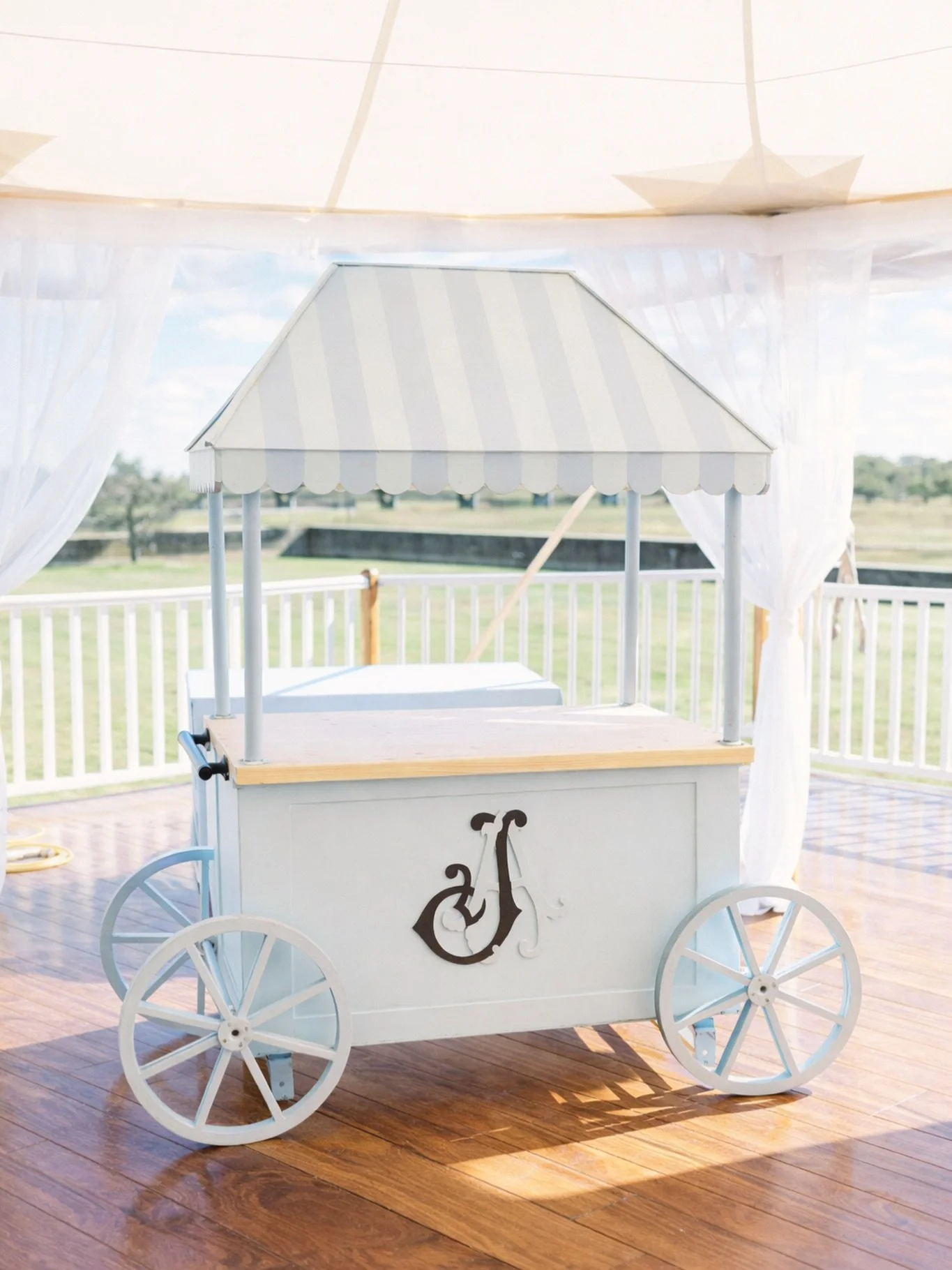 Shaken, styled, and ready to roll. Our classic martini cart brings a little old-school charm with a fresh coastal twist &mdash; perfect for signature cocktails, espresso martinis, or a chic welcome moment under the tent.

Because every great celebrat