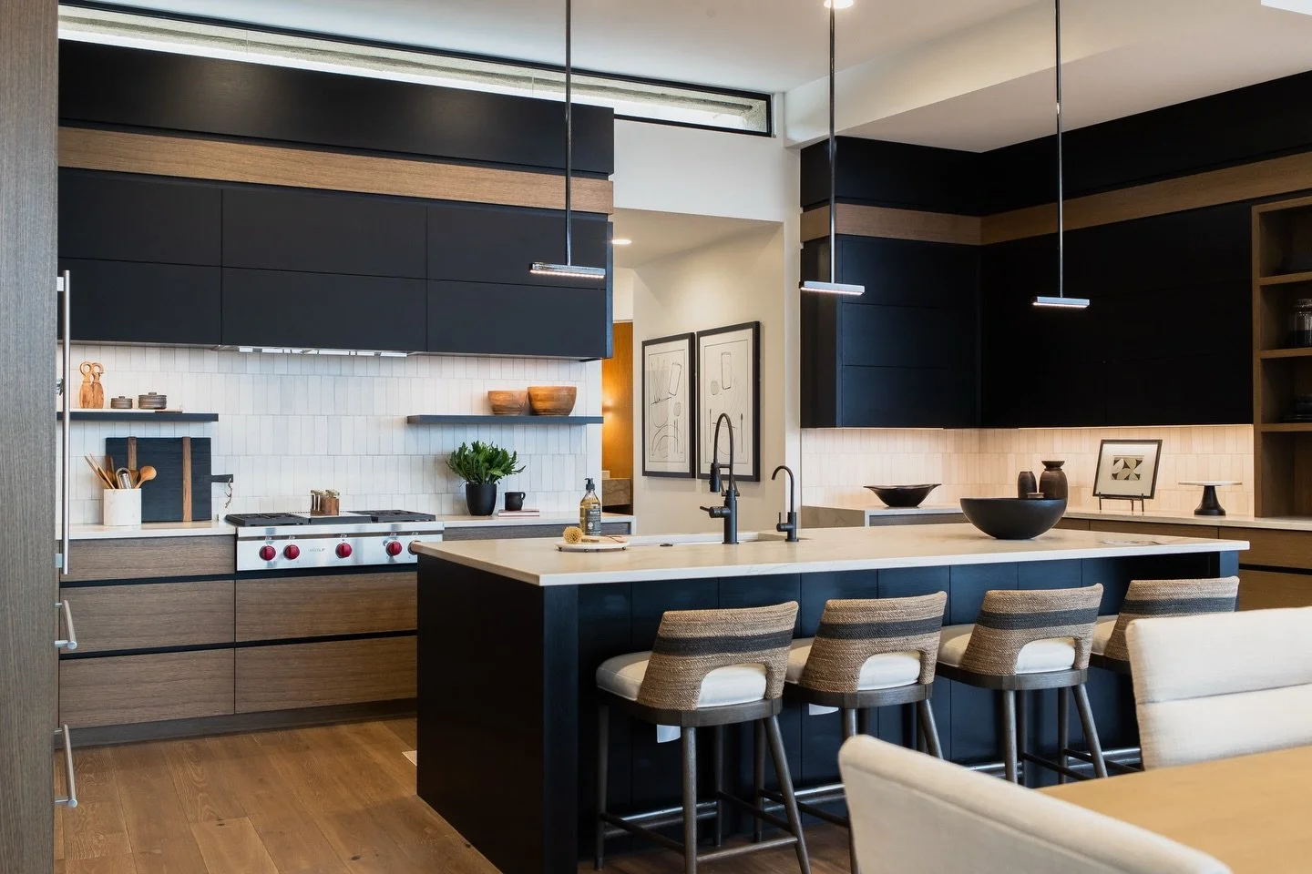 Throwback to this rift sawn white oak and handle-less design! A great combination of function and style.