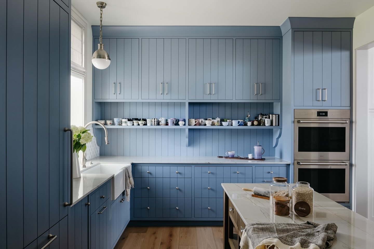 Step into this modern pantry with sleek blue cabinetry and open shelving, perfect for displaying a favorite coffee mug collection ✨

#kitchensofinstagram #kitchendesign #kitchen #utah #stgeorgeutah #homedecor #cabinets #gathr #houseandhome #homeinspo