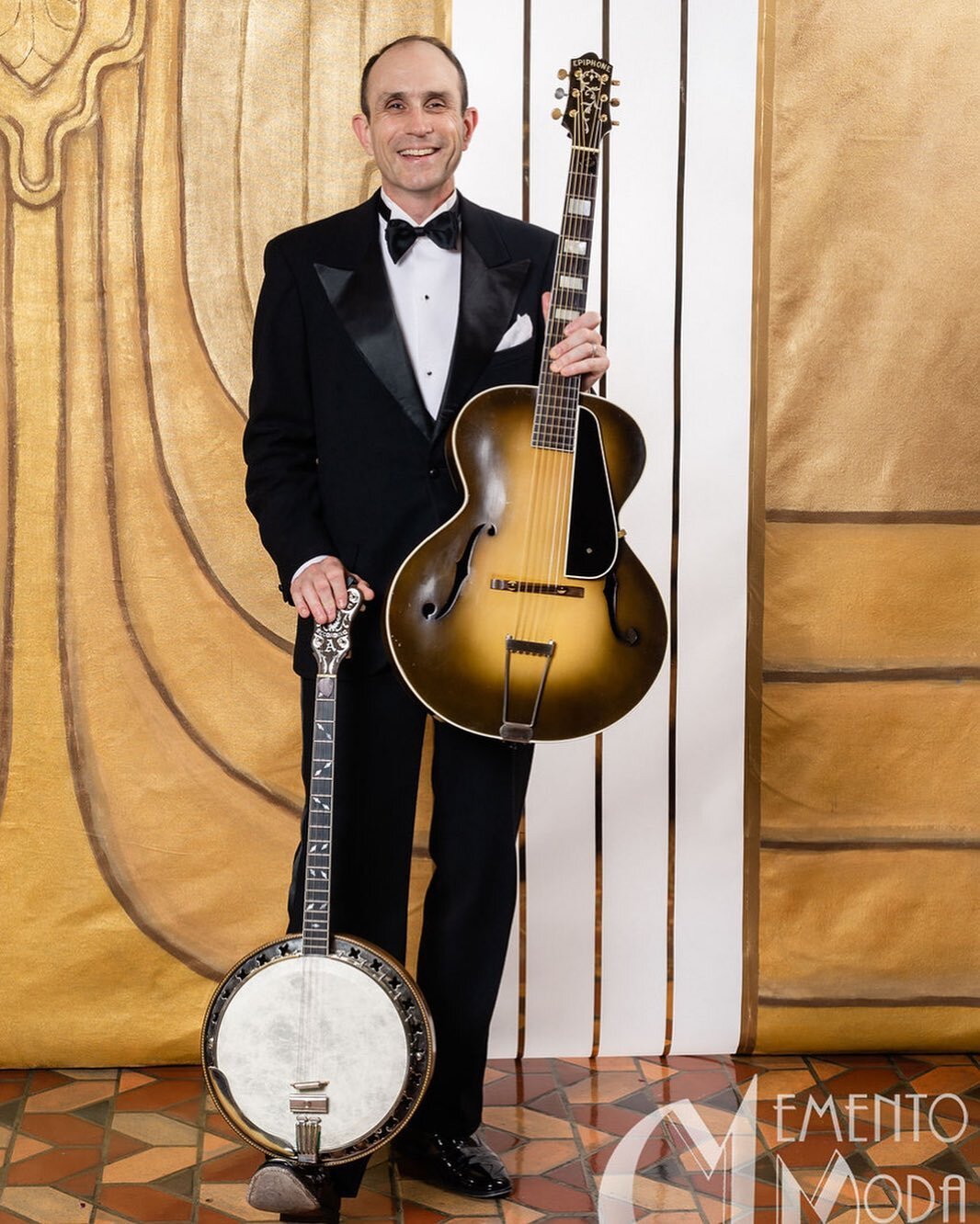 Thanks to @mementomoda_ for the glamour shot taken at this year&rsquo;s Art Deco Preservation Ball presented by the @artdecoca at the @oakparamount | early 1930s evening attire from @relicvintage | 1927 Epiphone Recording Model A banjo and 1934 Epiph