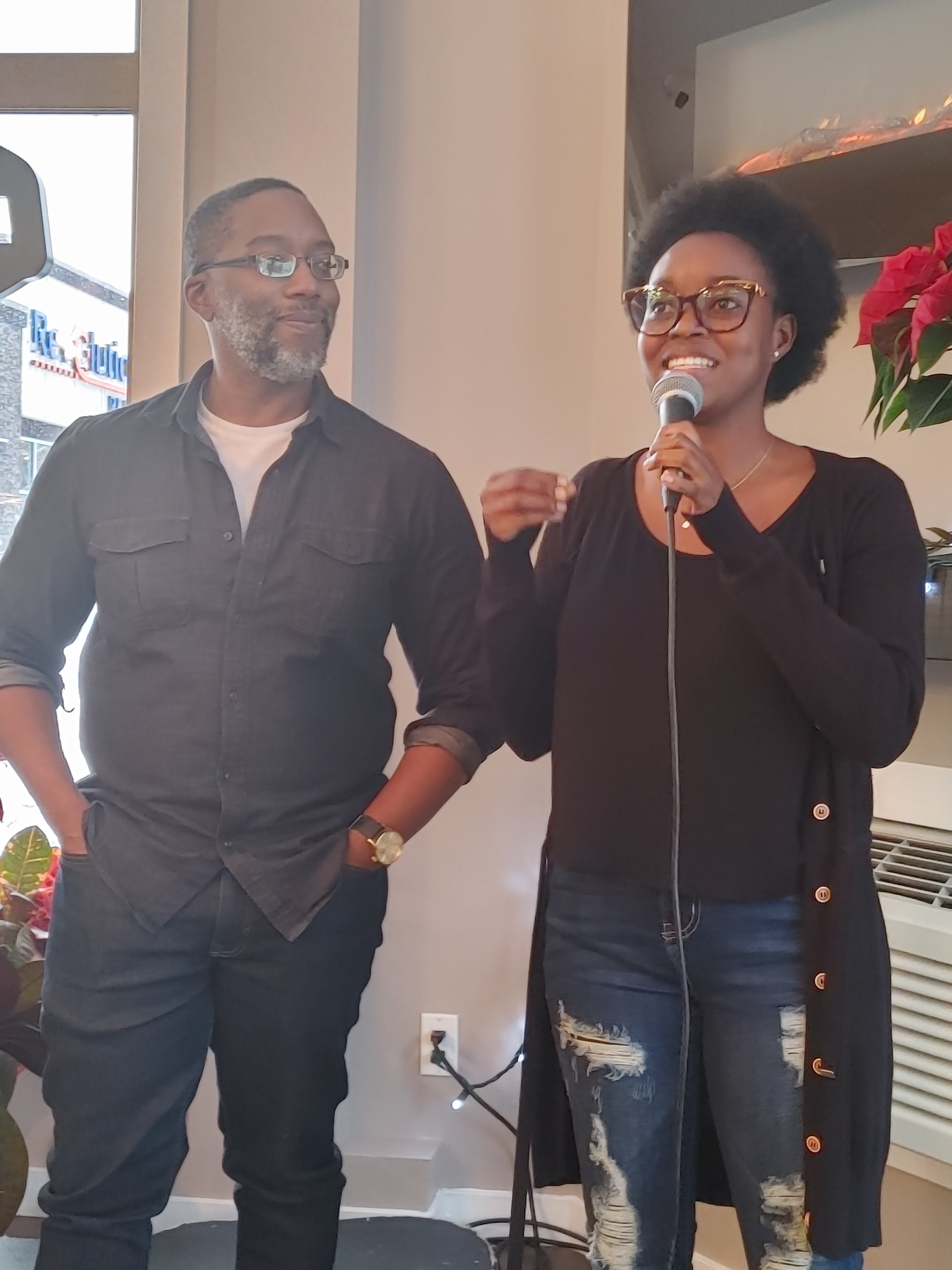   From left to right:  Jason, co-owner of  Diaspora cafe  (with his wife Keisha-not pictured) and Valerie, owner of Tusome Books saying their vote of thanks. 
