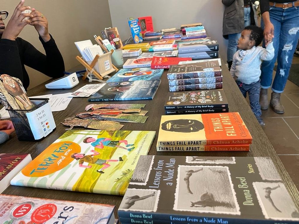  Winnie, our Administrative Coordinator on the left and my little godson on the right with his mommy. 