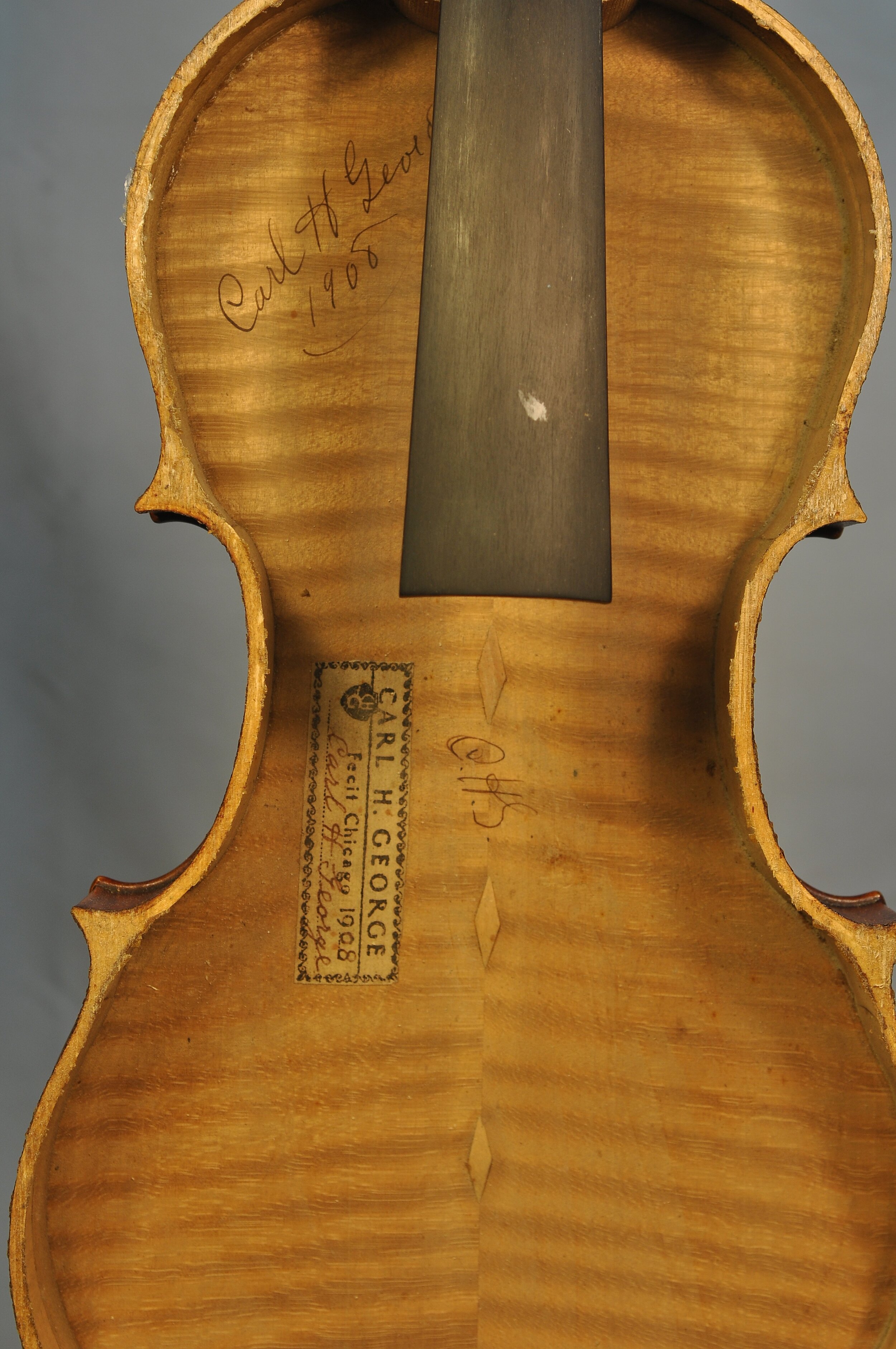 Label and interior of a violin by Carl George, c. 1908