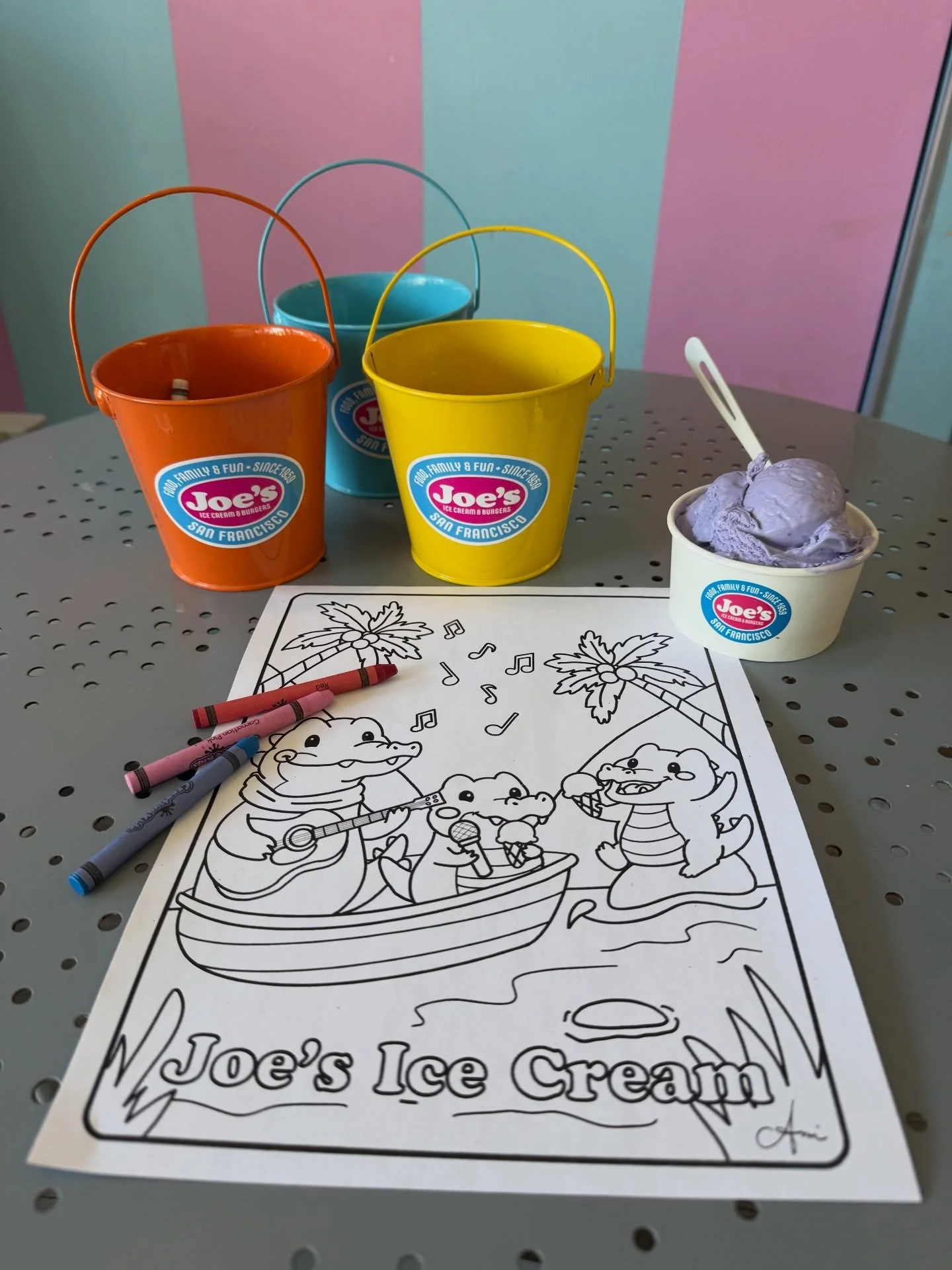When Claude meets new friends! 🐊🎵 
Grab our new Joe&rsquo;s coloring page, pick your crayons, and enjoy a scoop while you color. Spring fun starts here at Joe&rsquo;s!