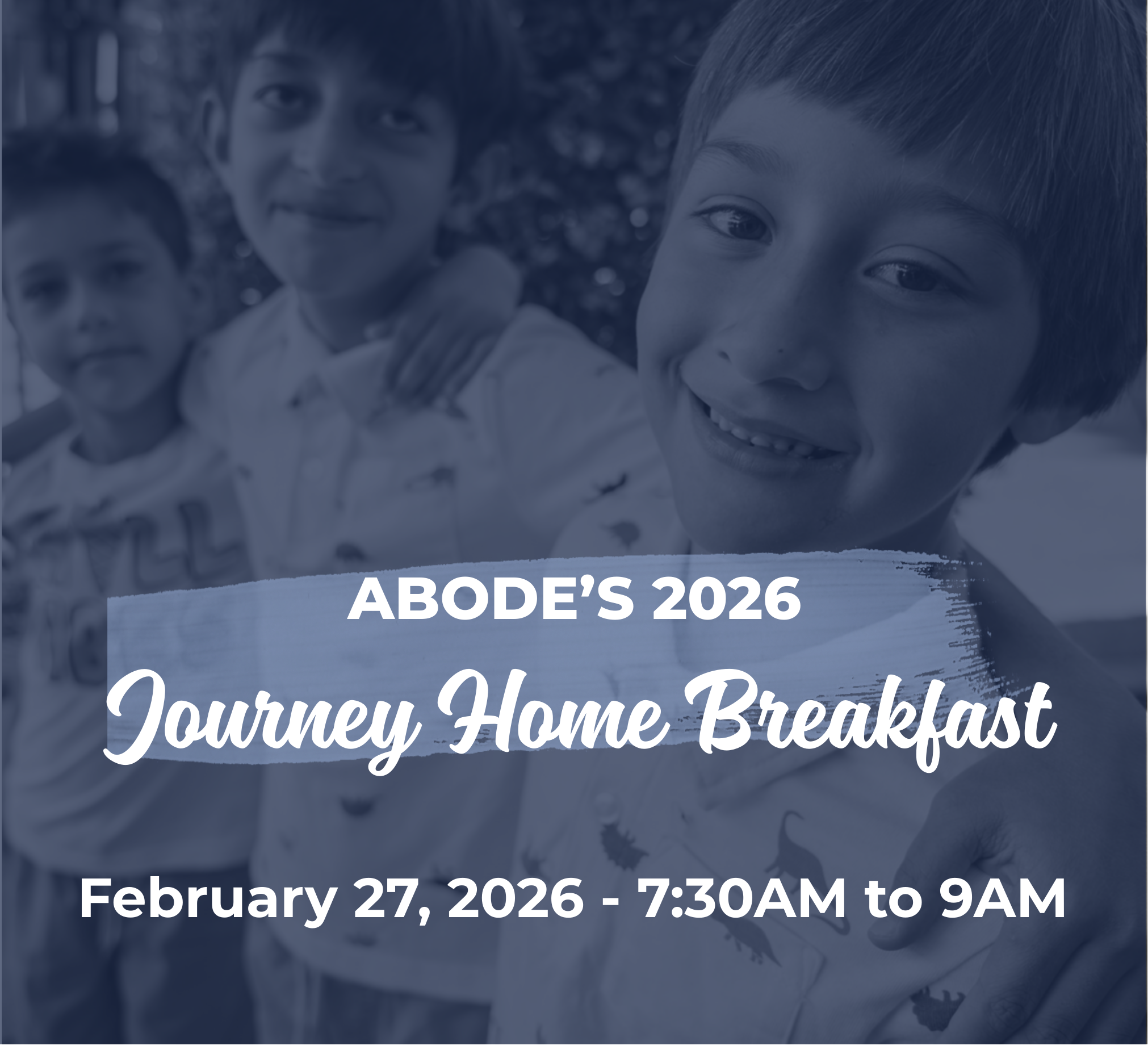 Three smiling children standing close together, arms around each other. Overlaid text reads ‘Abode’s 2026 Journey Home Breakfast’ and ‘February 27, 2026 – 7:30 AM to 9 AM.’