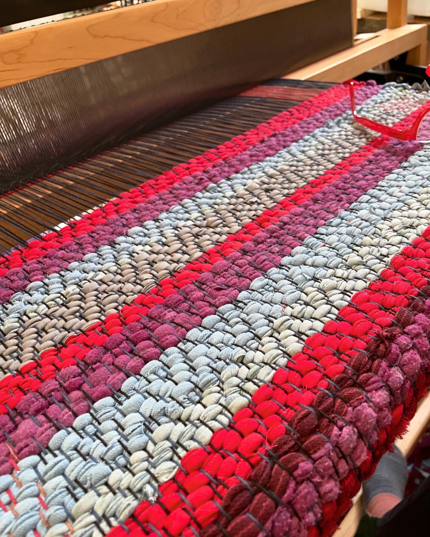 Sometimes 
Color is the medicine 
❤️
And simplicity 
Is the best delivery 
💜
Weaving rag rugs 
🧶domestic and thrifty 
🧵
Sending you some color and love from my studio 
🪢
#ragrugs #colorismedicine #weavingrugs #weaving #handweaversofinstagram #han