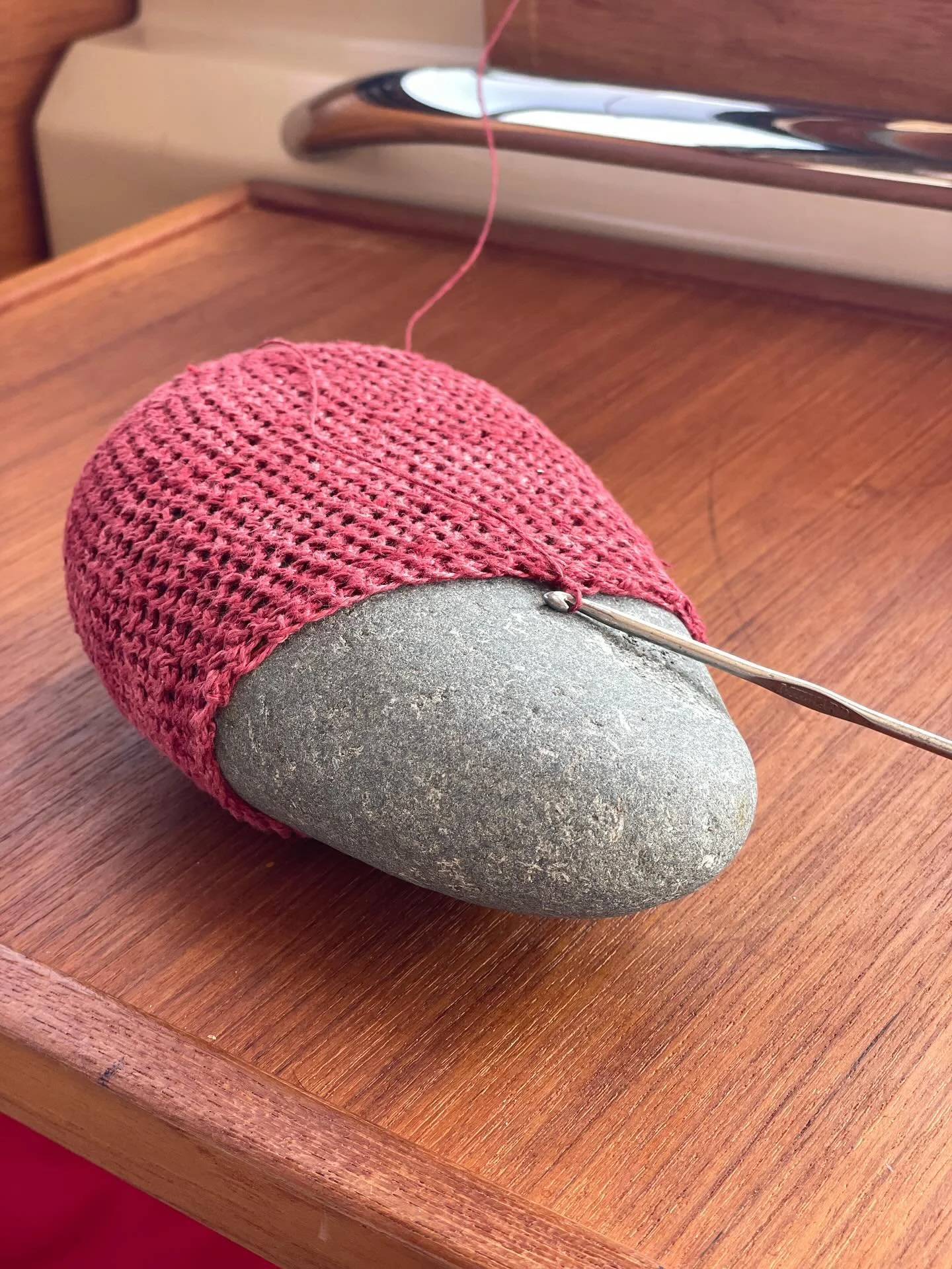 Those last few rows to bind 
Securely holding each stone
..
Those rows are a bit of a finagle. 
..
A tender closure 
Insuring that the cozy 
Stay firmly around each stone.
..
Inspired by erratics
Random large boulders 
..
McGlathery Island
Near Stoni