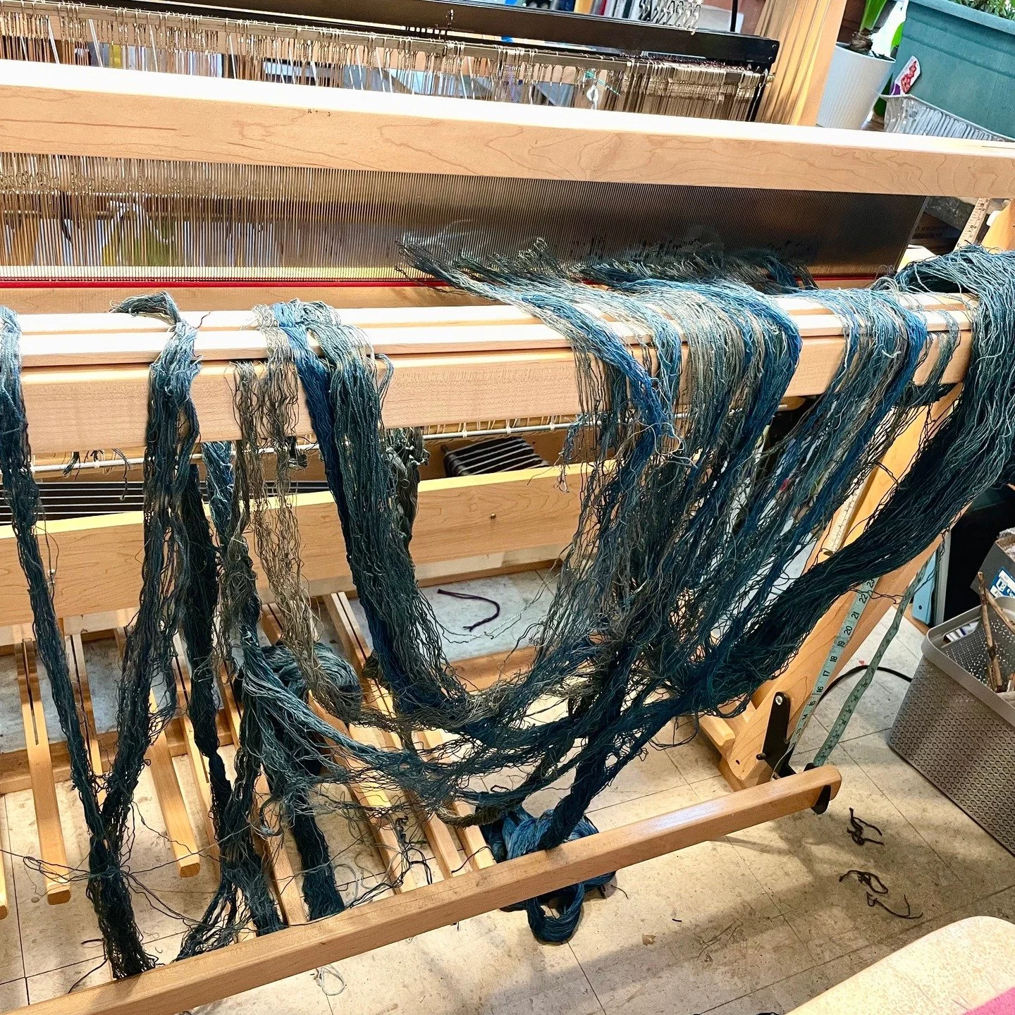 In an increasingly chaotic and unpredictable world, I long to create a sense of order -- even if it is only in my studio with thread.

Metaphors aside, the simple act of untangling a web of indigo dyed, linen and cotton threads has a profound and cal