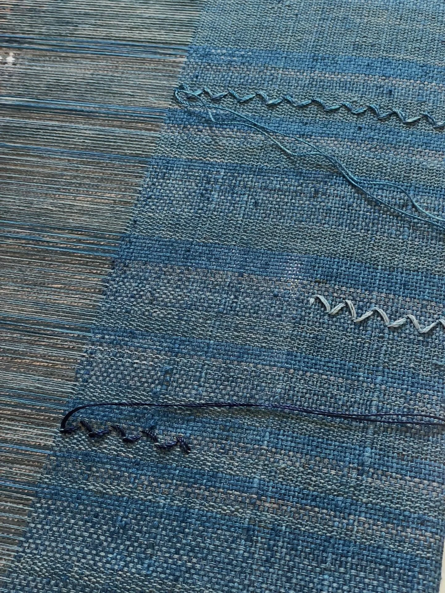 Warp in progress. 
Blue. 
🩵
The color of the sky. 
The ocean 
My eyes 
The color of mystery.
The color of longing and loss. 
🩵🩵🩵🩵🩵 
#weaving #indigo #linen
#handweavingofinstagram #handweaving