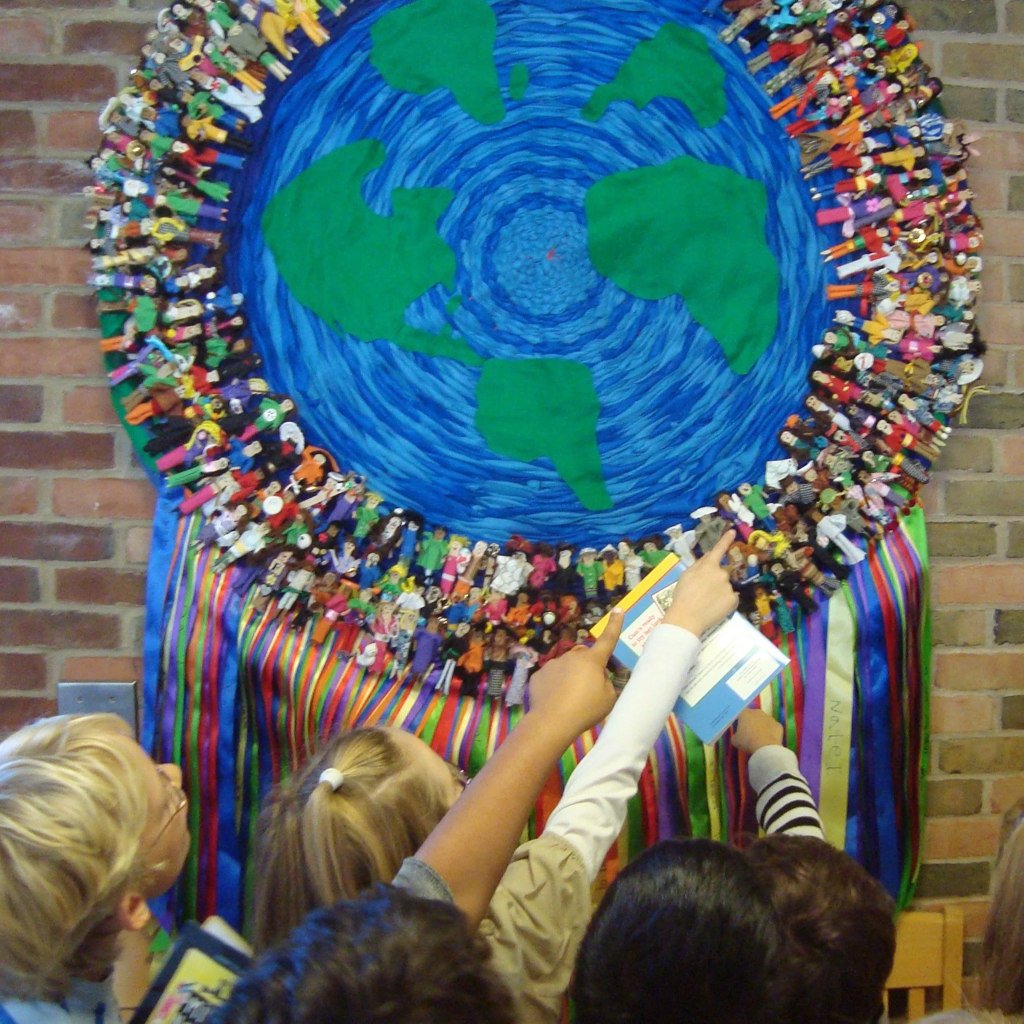 Seeking donations of fabric, felt and ribbons for a community art project at two underserved rural Maine schools.

The Mandala Community Weaving has been a steady force in my teaching career. Over and over again it shows that creativity can raise sel