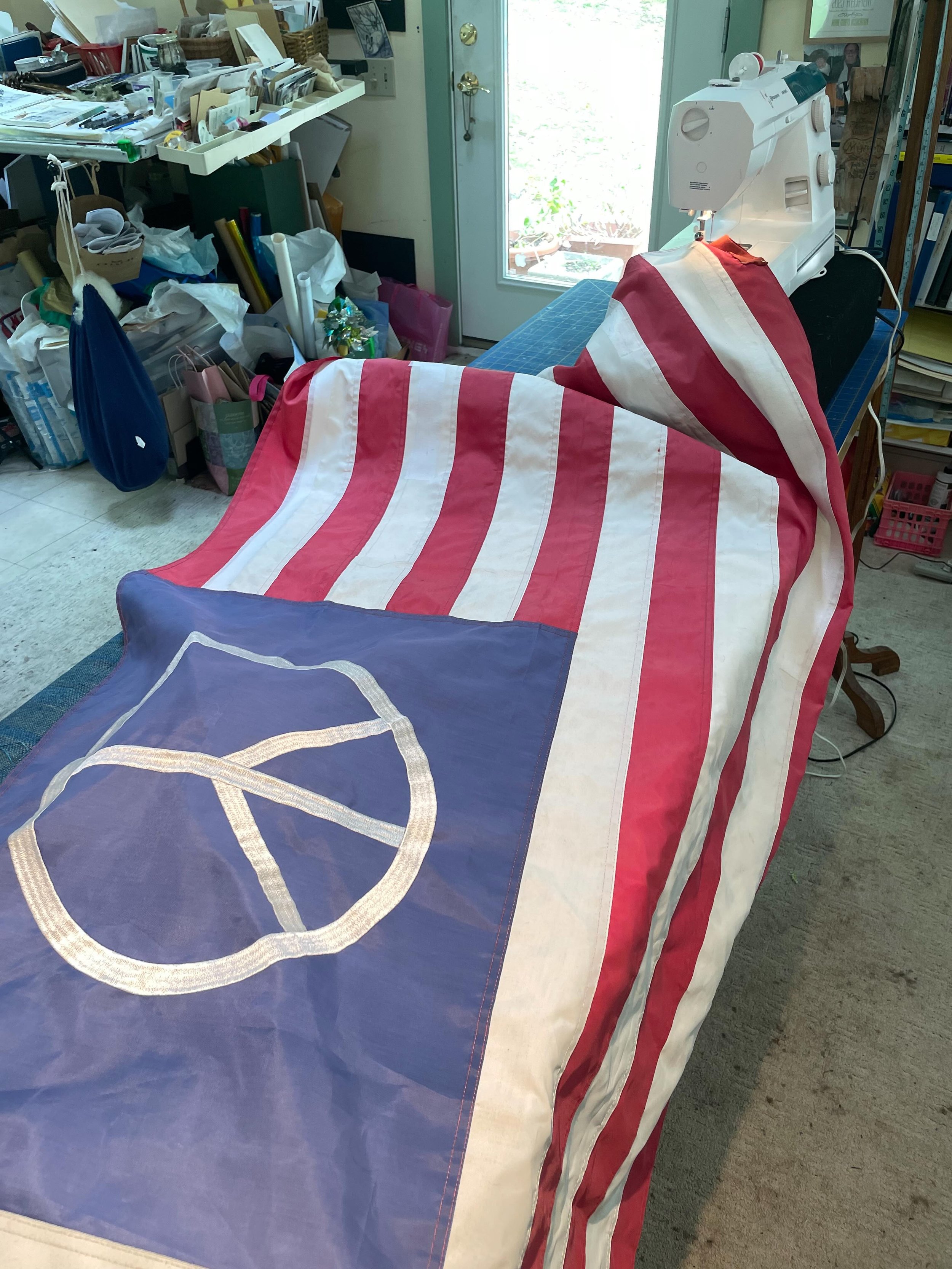 There's a metaphor here 
Perhaps too blatant

Mending the flag.
 
Happy Memorial Day.
&hearts;️💙🤍&hearts;️💙🤍
A day of solemn contemplation on the cost of freedom.

I celebrate and honor those who risked and ultimately lost life in service to our 